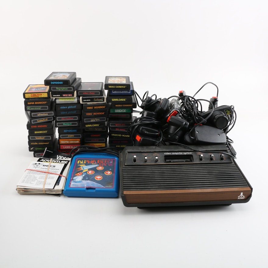 Vintage Atari 2600 Console with Games and Accessories