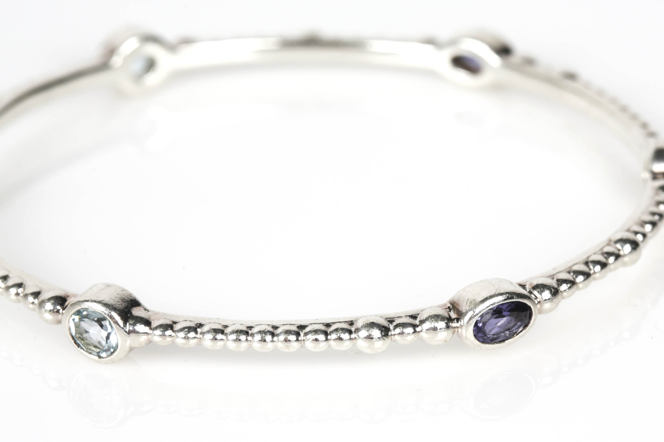 T & B Sterling Silver Blue Topaz and Amethyst Bangle