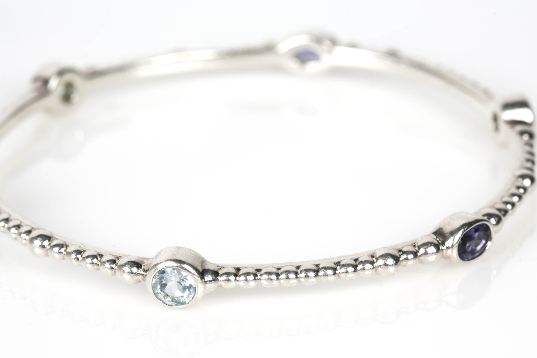 T & B Sterling Silver Blue Topaz and Amethyst Bangle