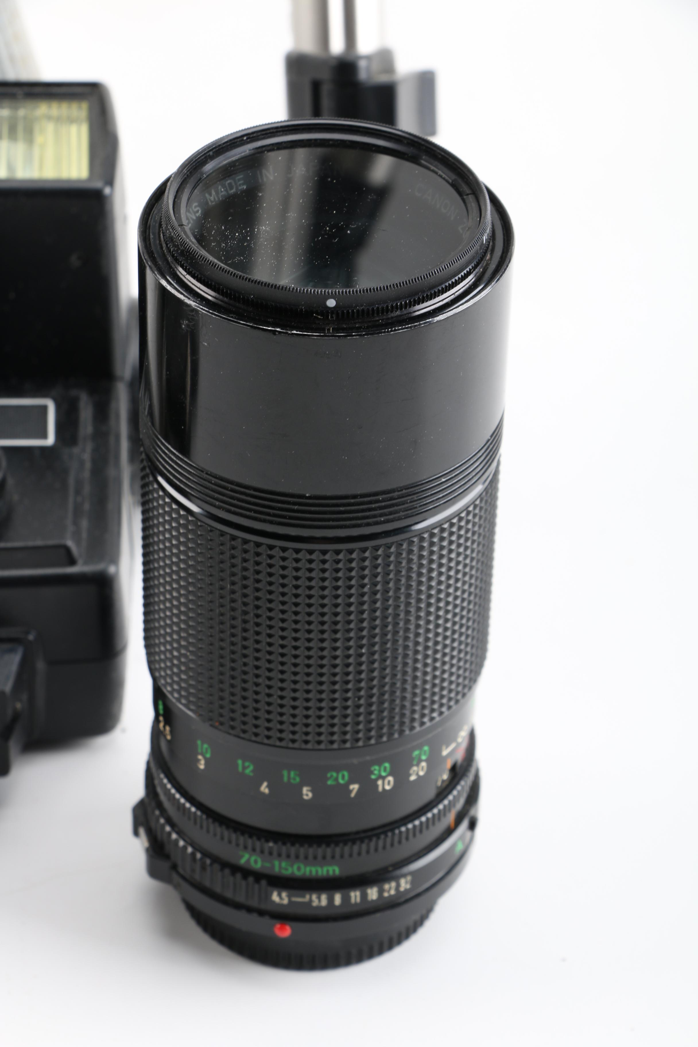 Vintage Canon AE-1 35mm SLR Camera with Tripods, Flash Unit, and Lenses