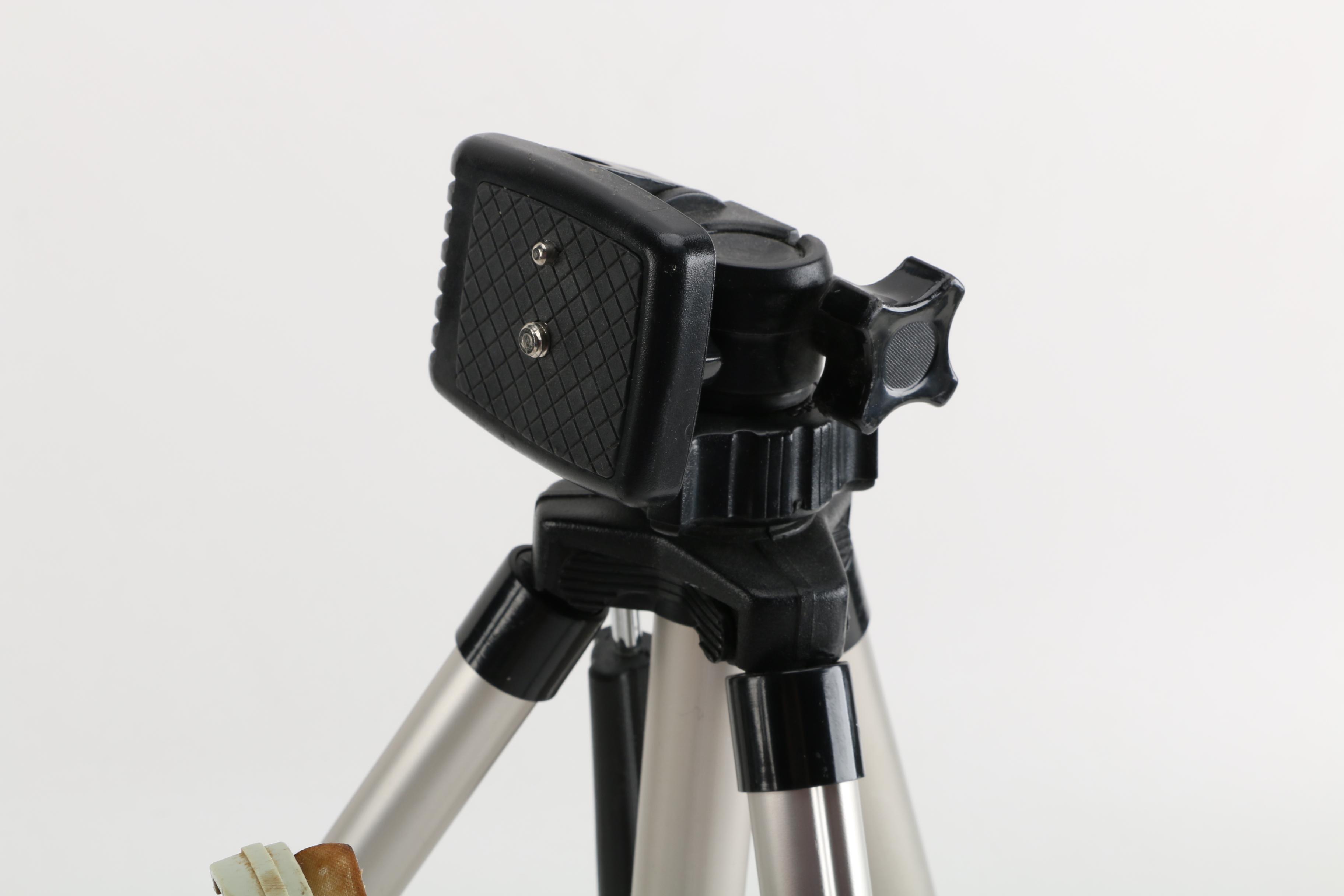 Vintage Canon AE-1 35mm SLR Camera with Tripods, Flash Unit, and Lenses