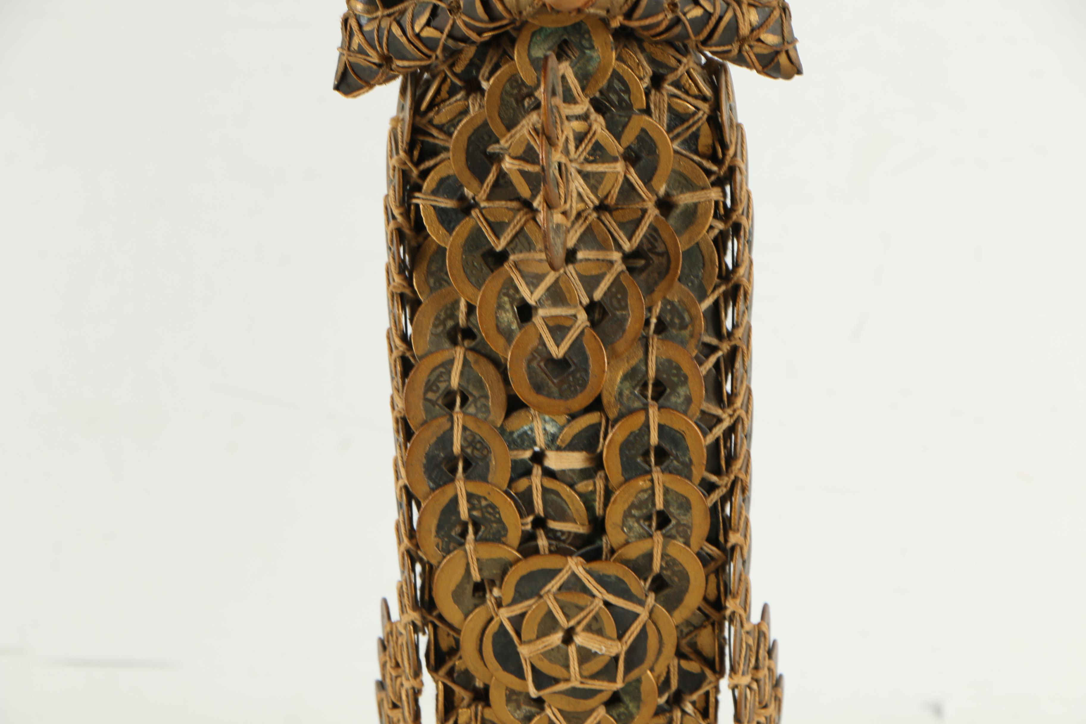 Balinese Kepeng Coin Statues