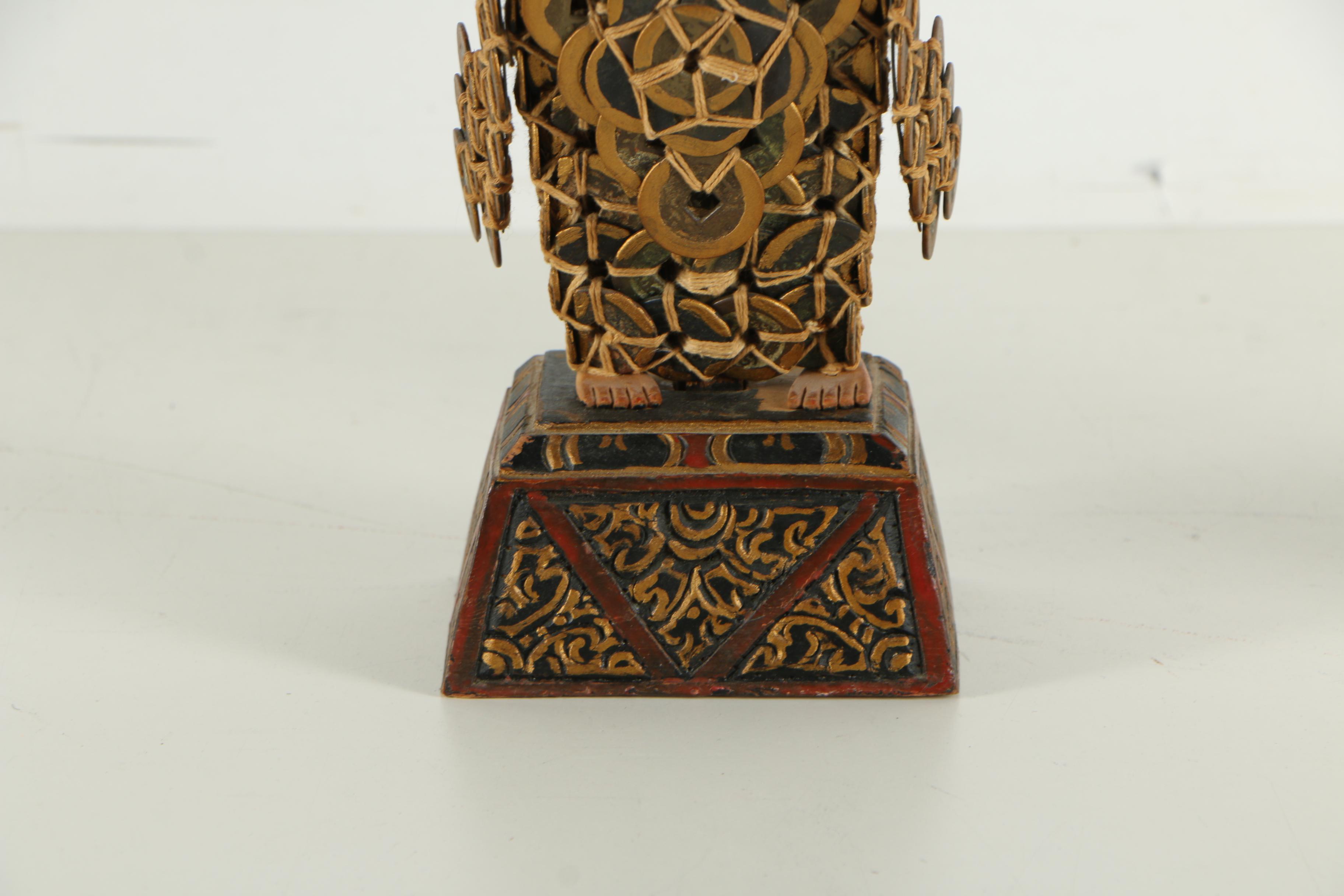 Balinese Kepeng Coin Statues