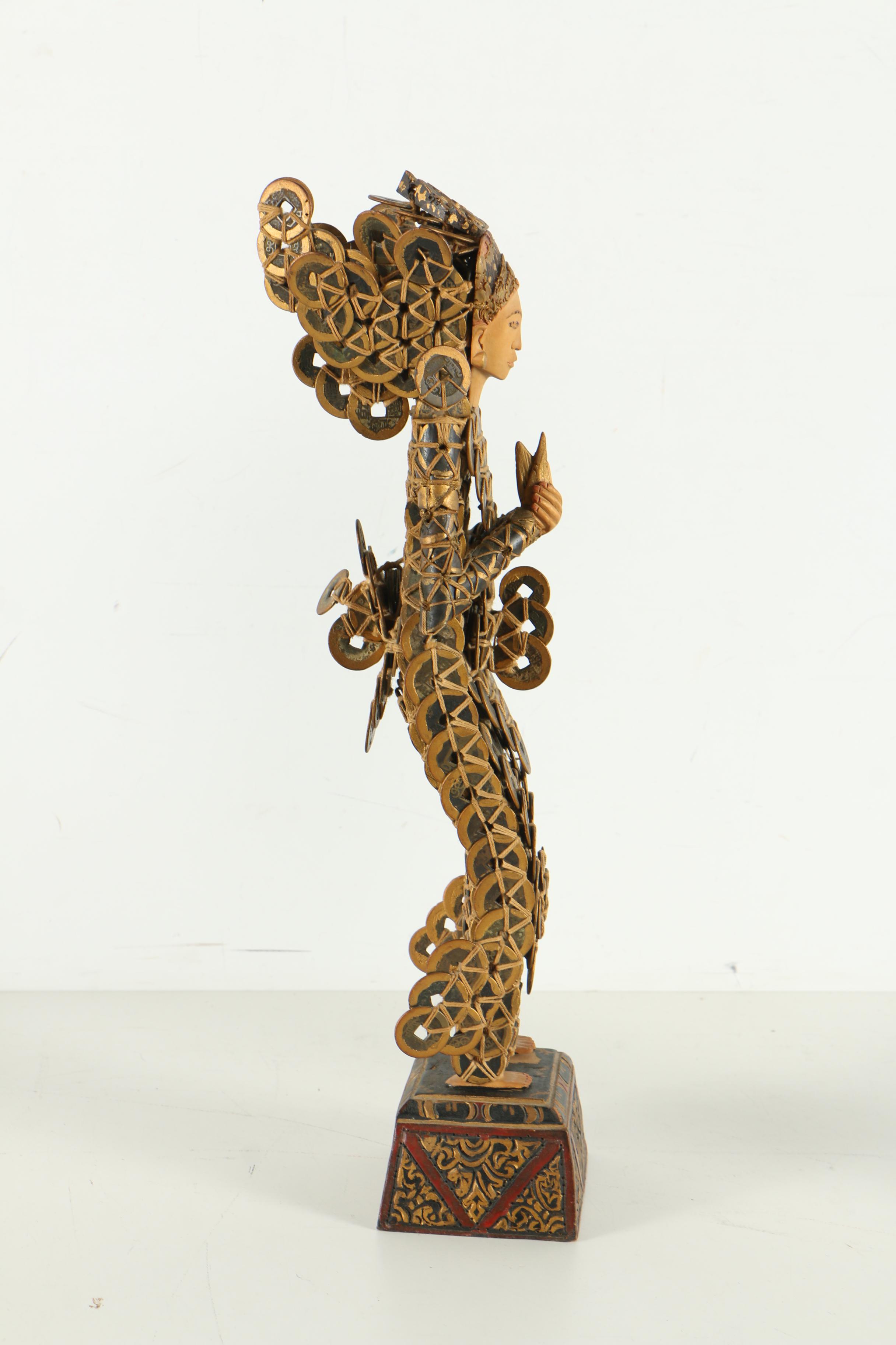 Balinese Kepeng Coin Statues