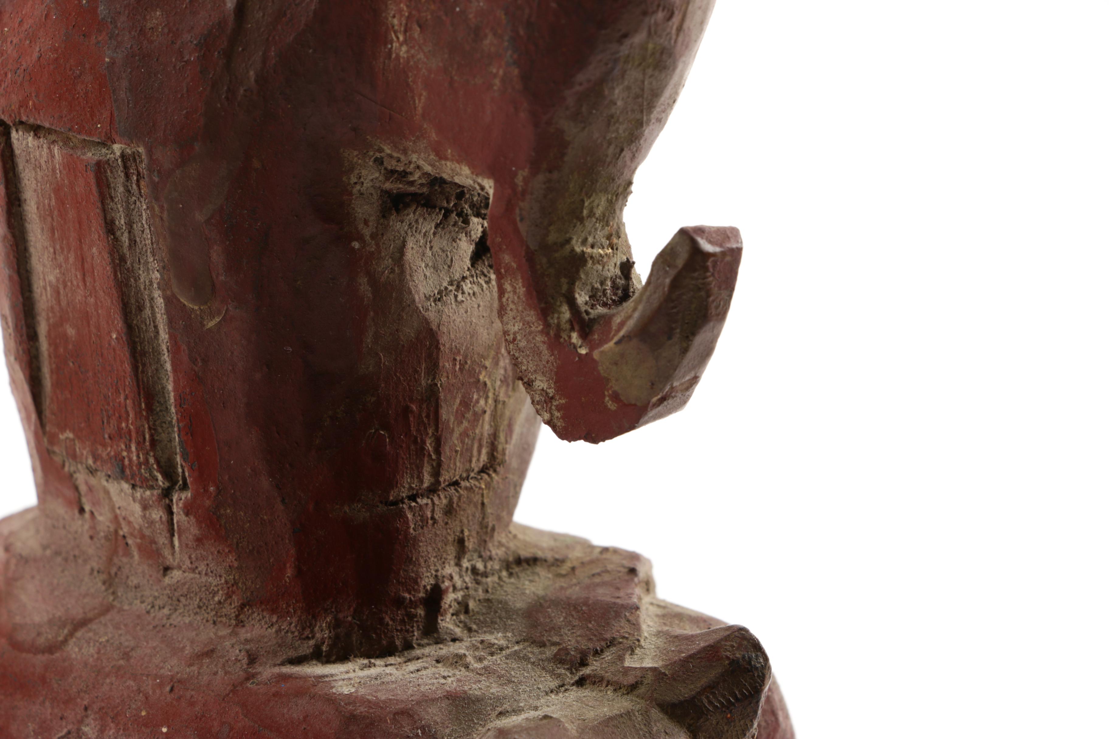 Wooden Figurine of Man Seated on Stylized Animal