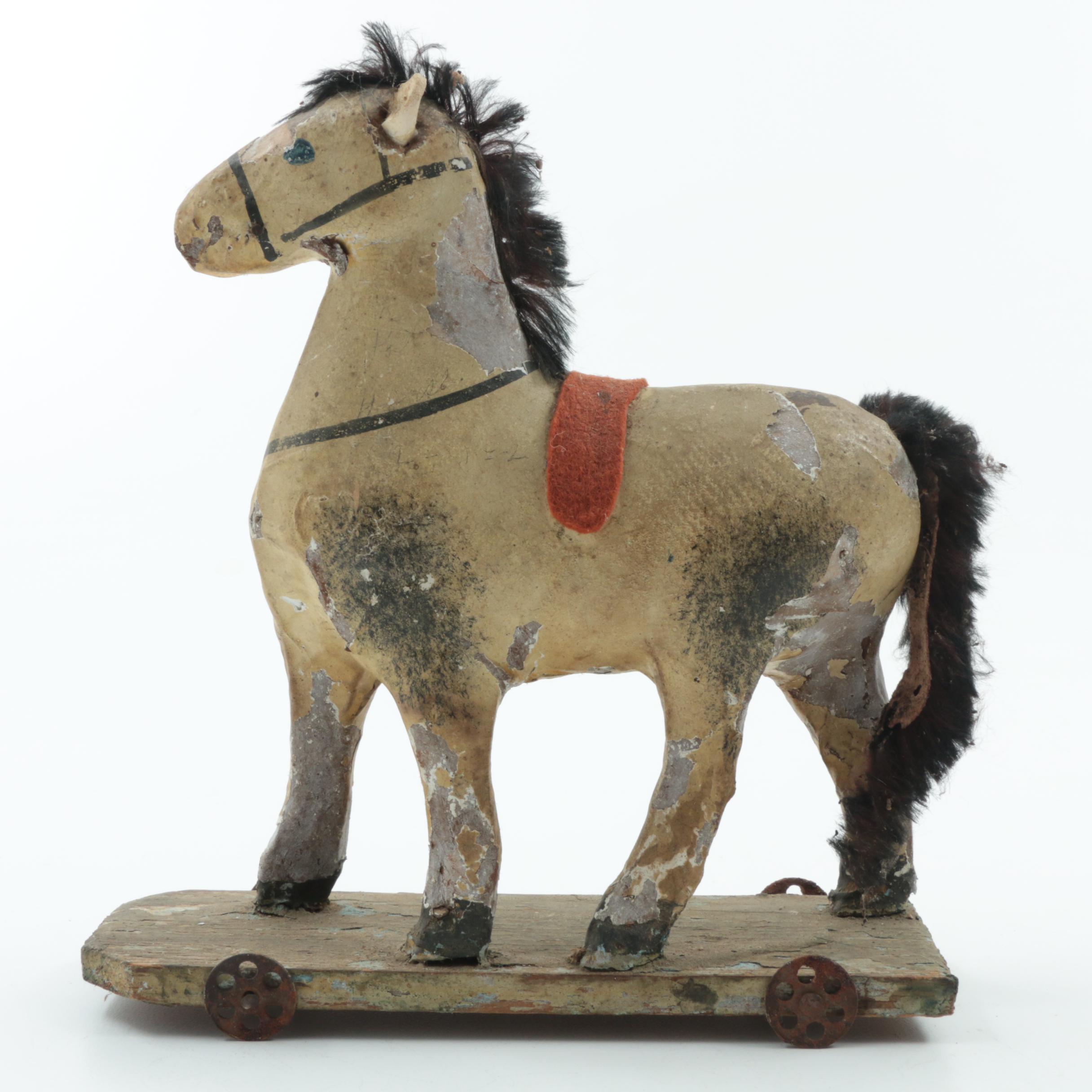 Two Antique Pony Toys