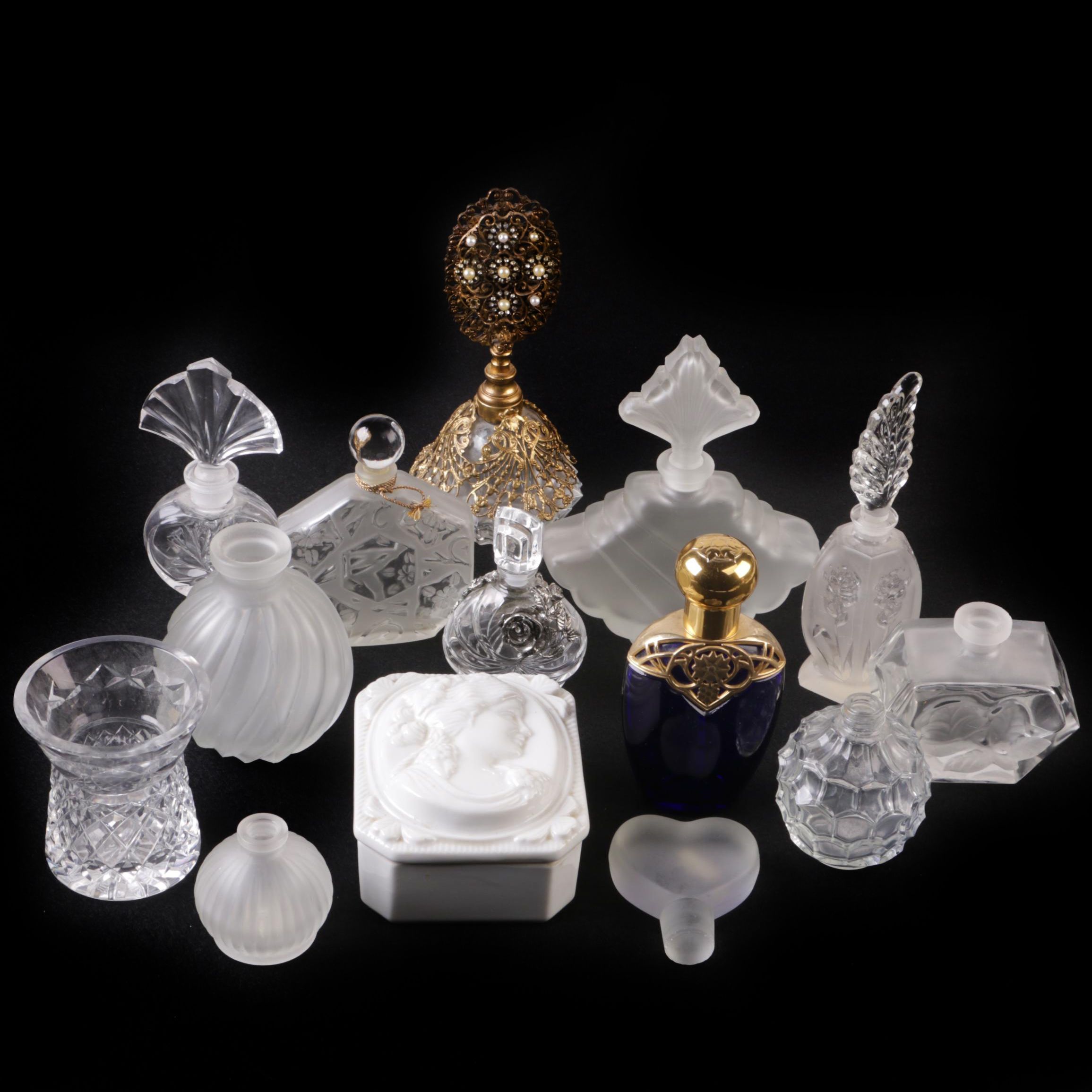 Perfume Bottles Including Avon "Mesmerize"