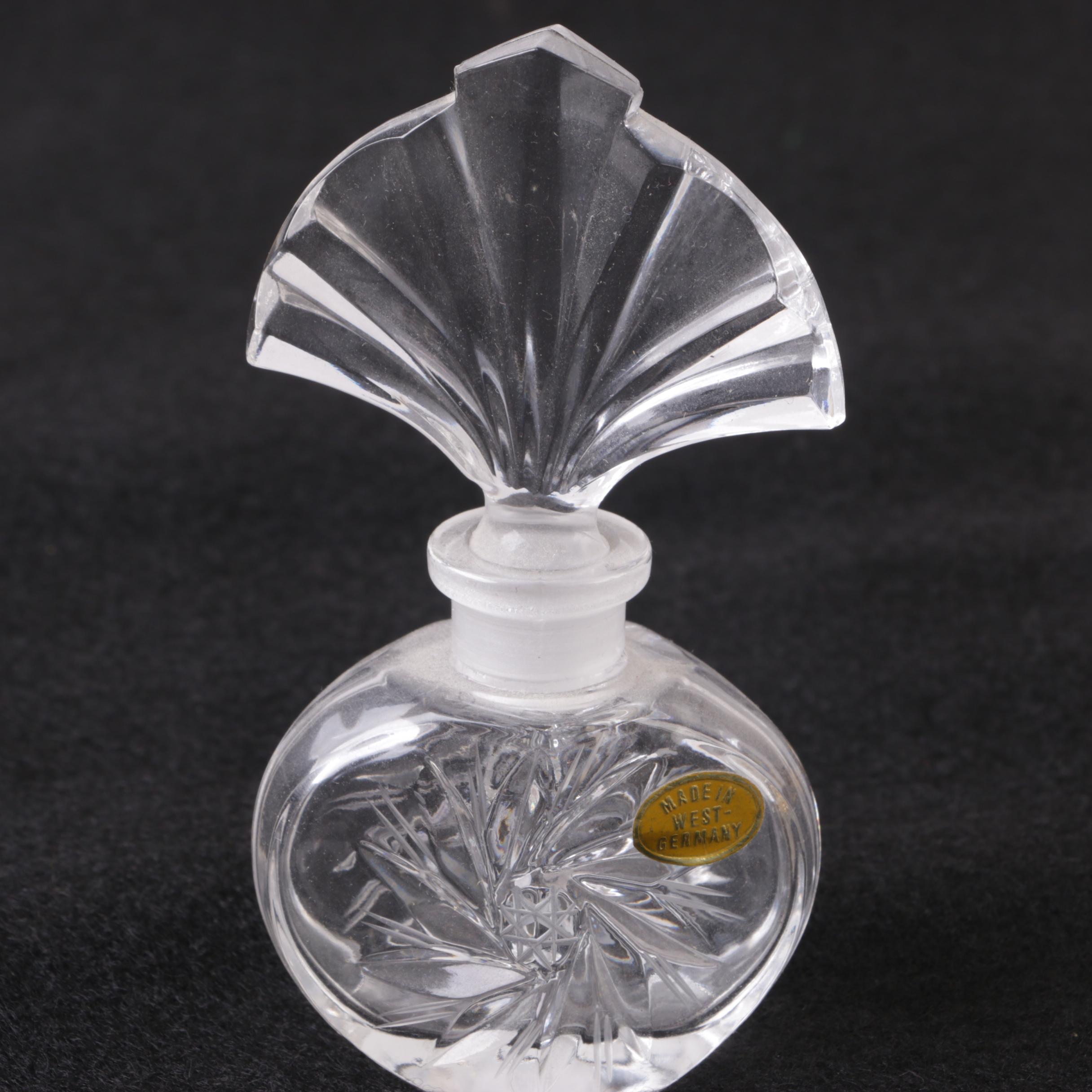 Perfume Bottles Including Avon "Mesmerize"