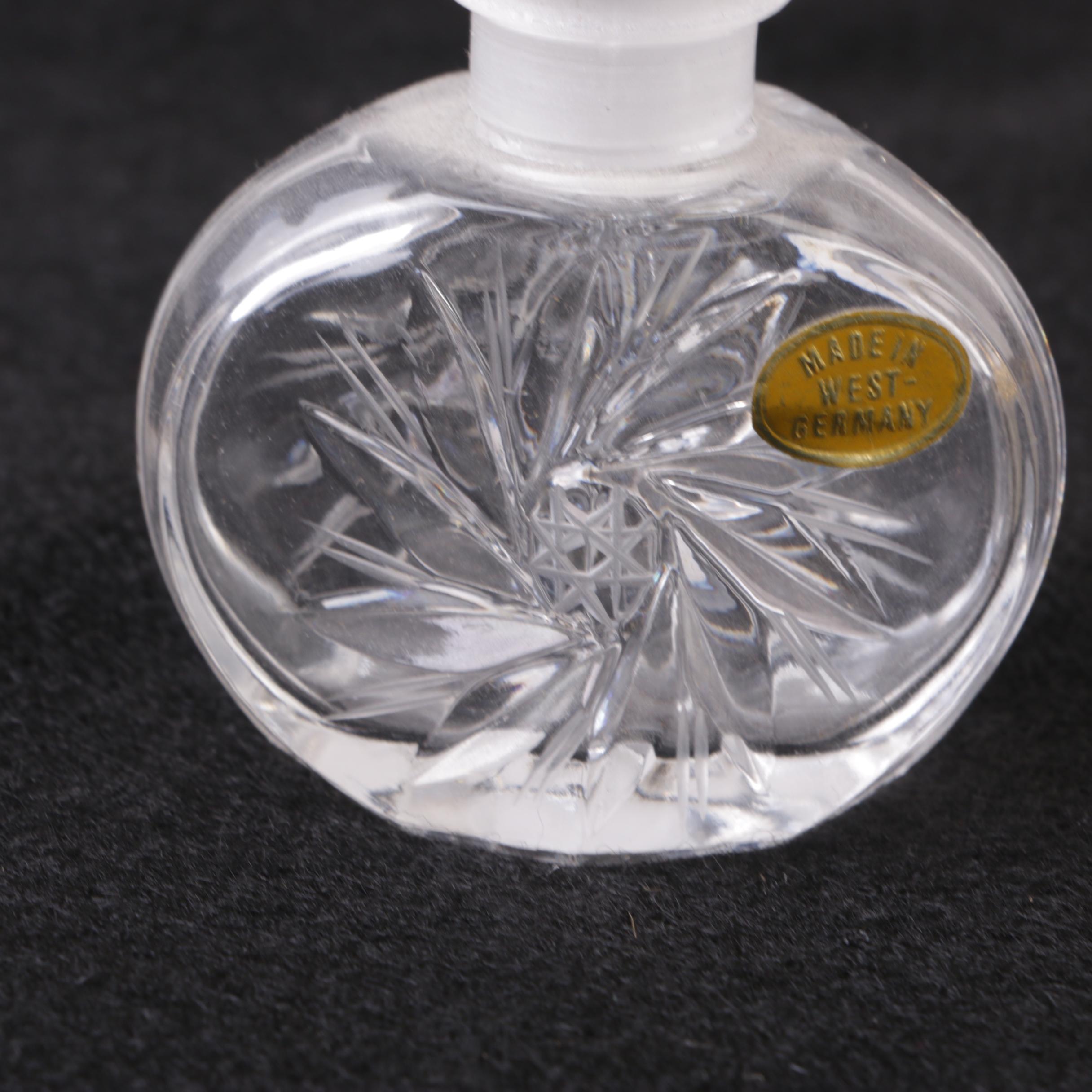 Perfume Bottles Including Avon "Mesmerize"