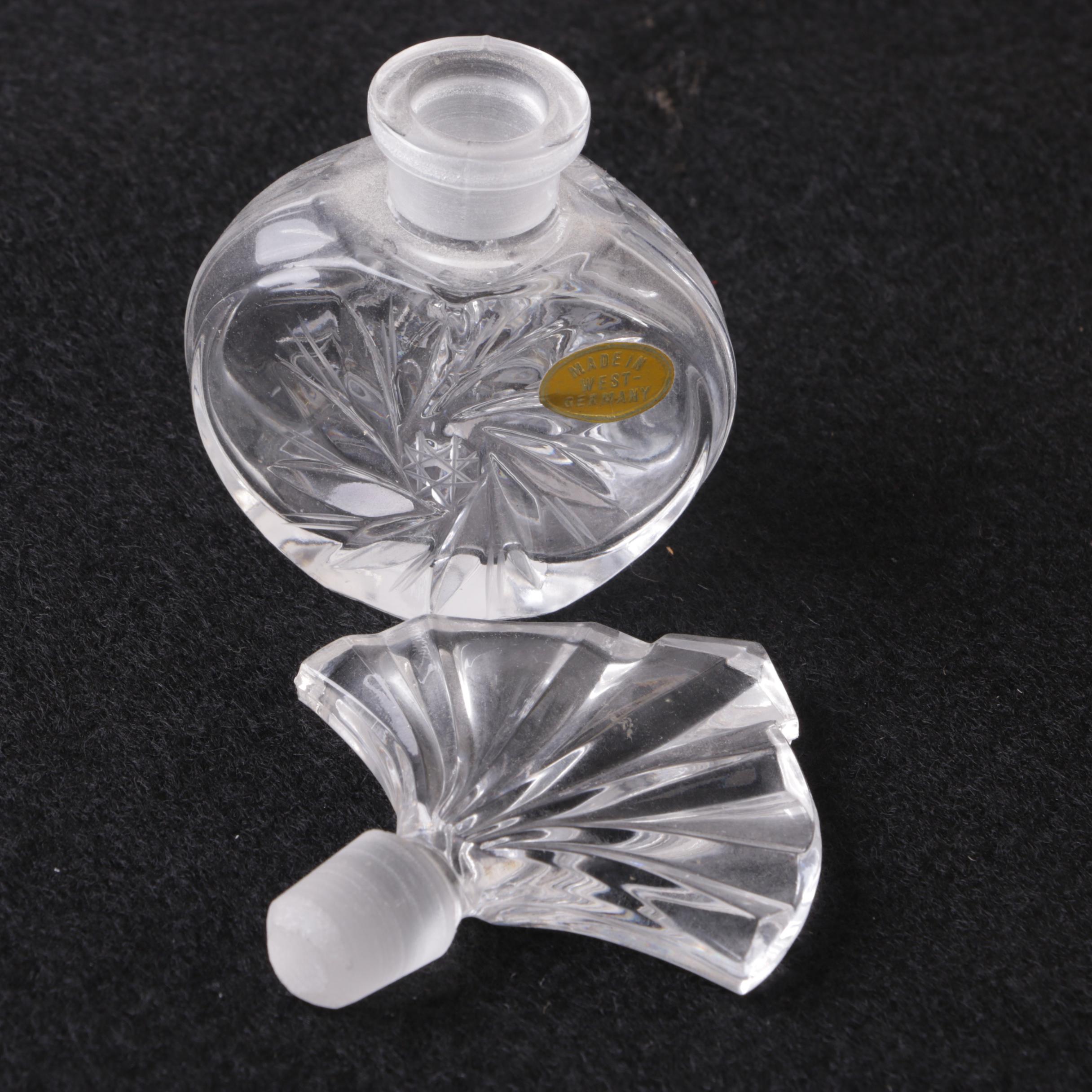 Perfume Bottles Including Avon "Mesmerize"