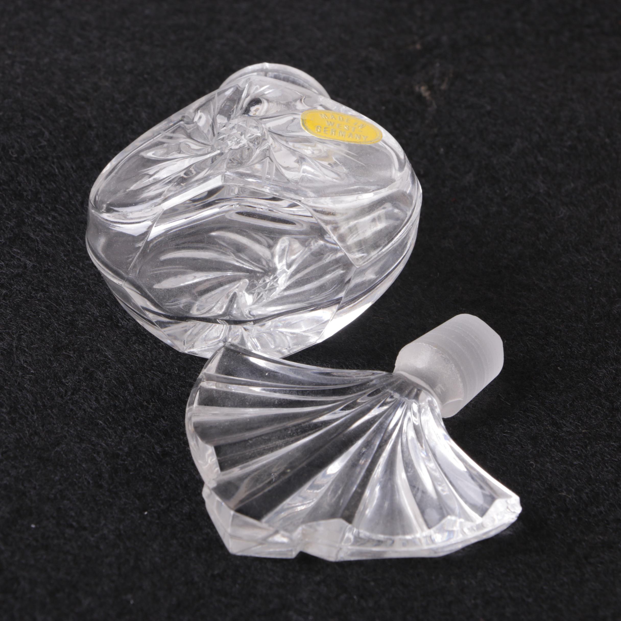 Perfume Bottles Including Avon "Mesmerize"