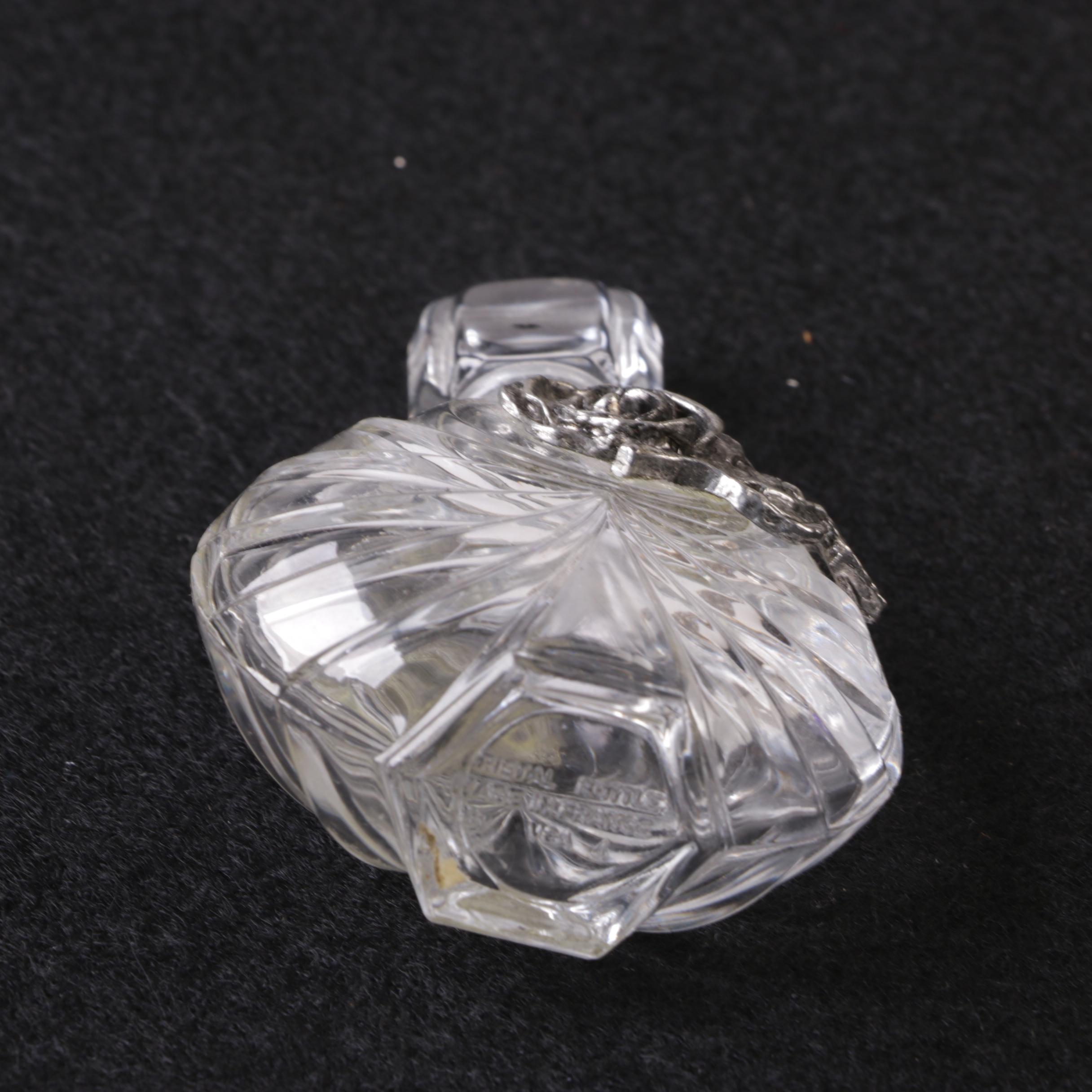 Perfume Bottles Including Avon "Mesmerize"