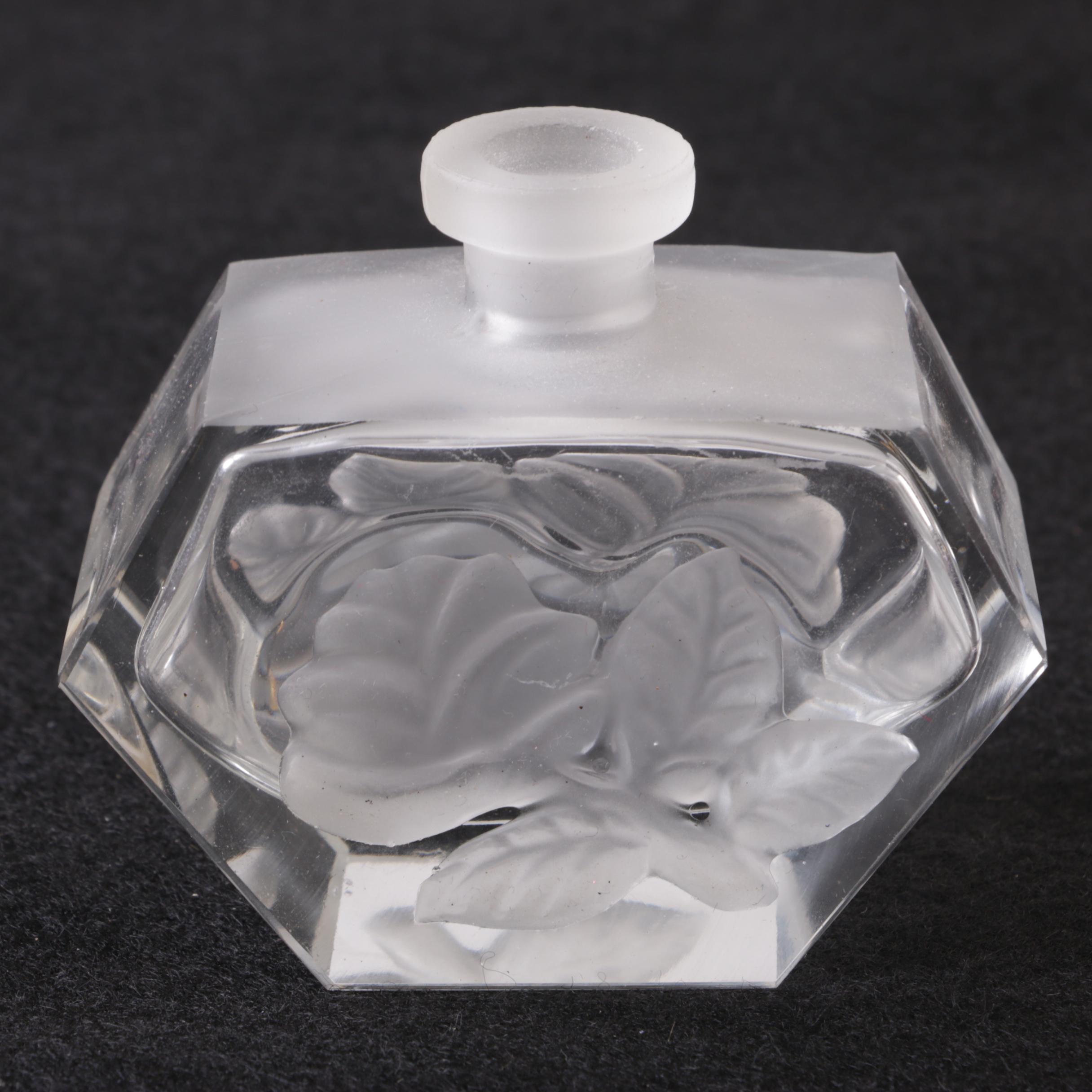 Perfume Bottles Including Avon "Mesmerize"