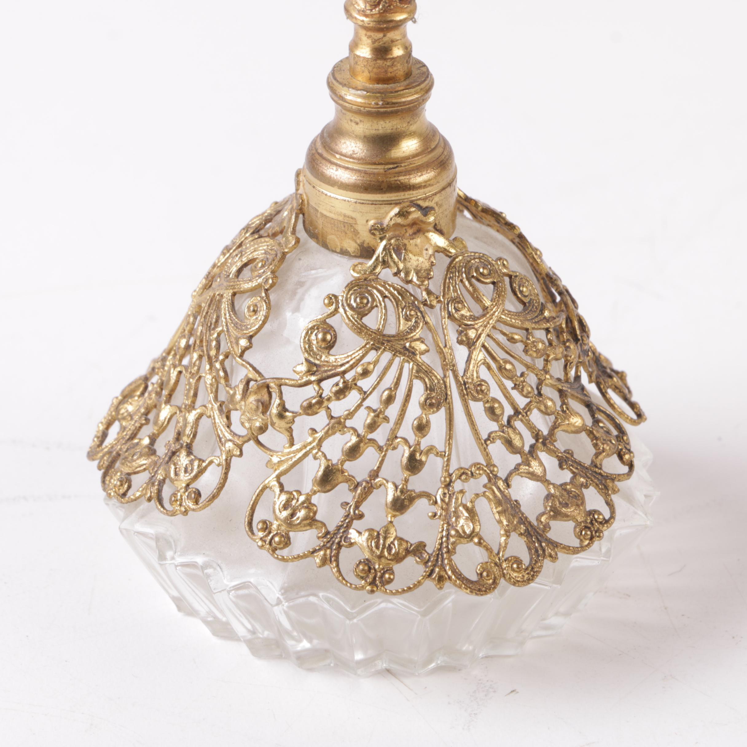 Perfume Bottles Including Avon "Mesmerize"