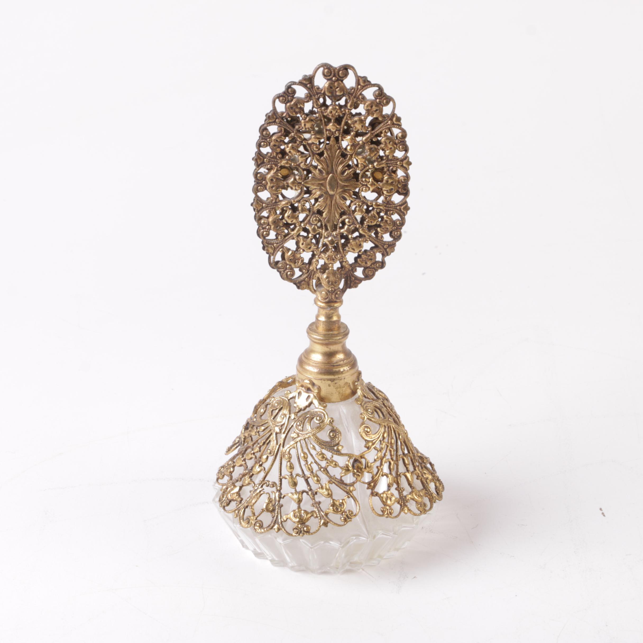 Perfume Bottles Including Avon "Mesmerize"