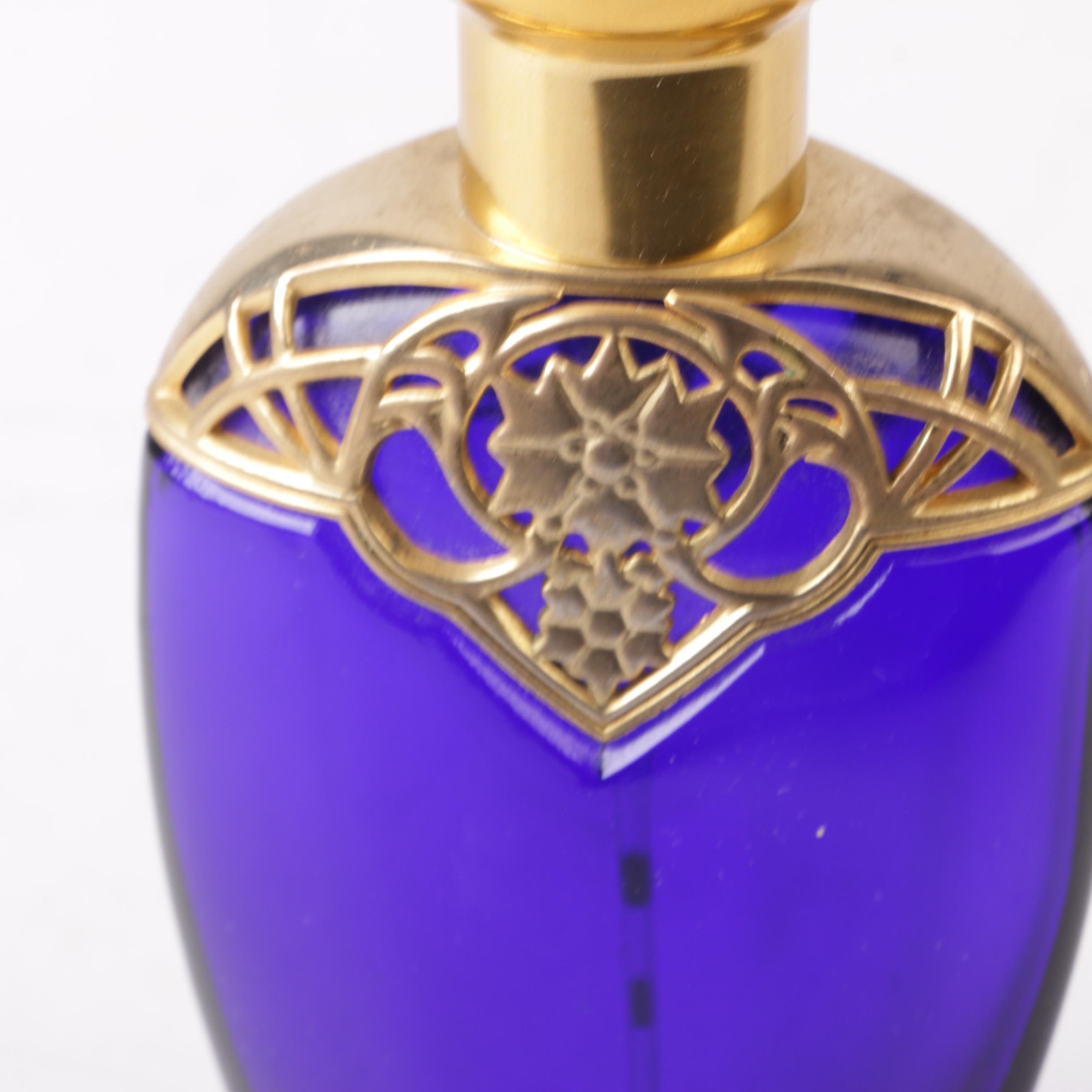 Perfume Bottles Including Avon "Mesmerize"