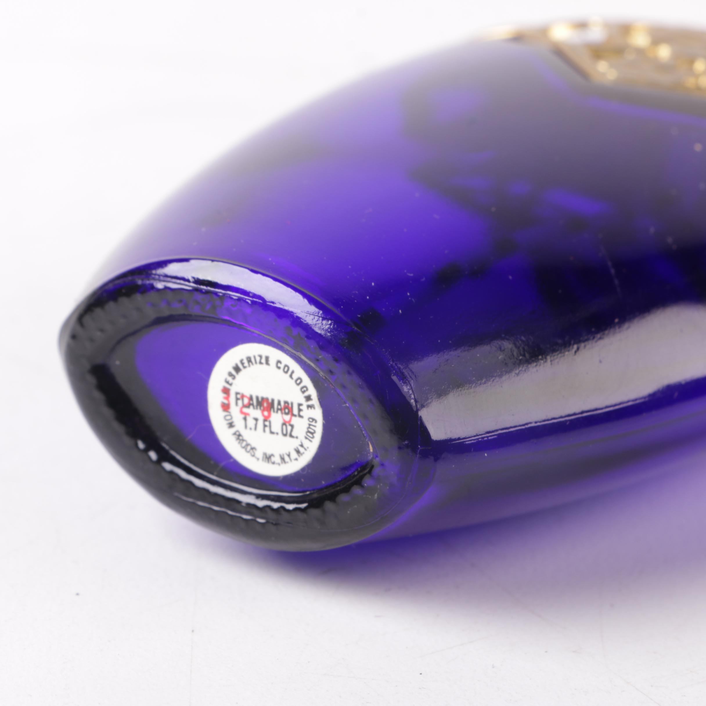 Perfume Bottles Including Avon "Mesmerize"