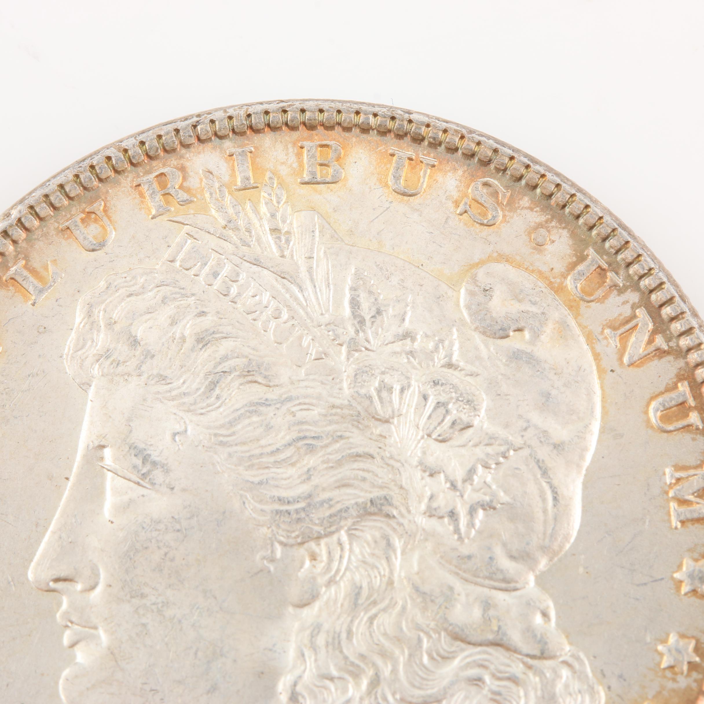 Morgan Silver Dollar and a Peace Silver Dollar