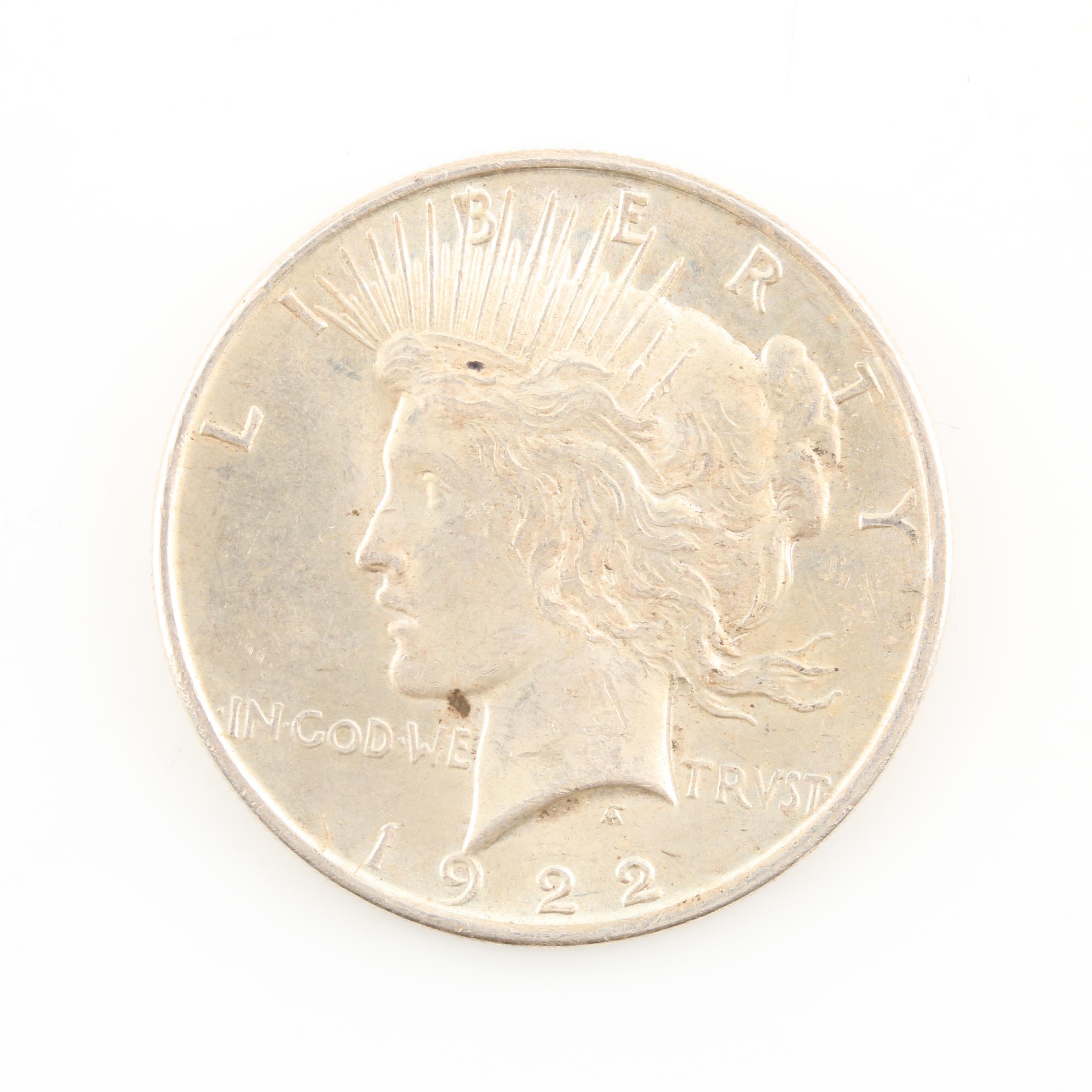 Morgan Silver Dollar and a Peace Silver Dollar