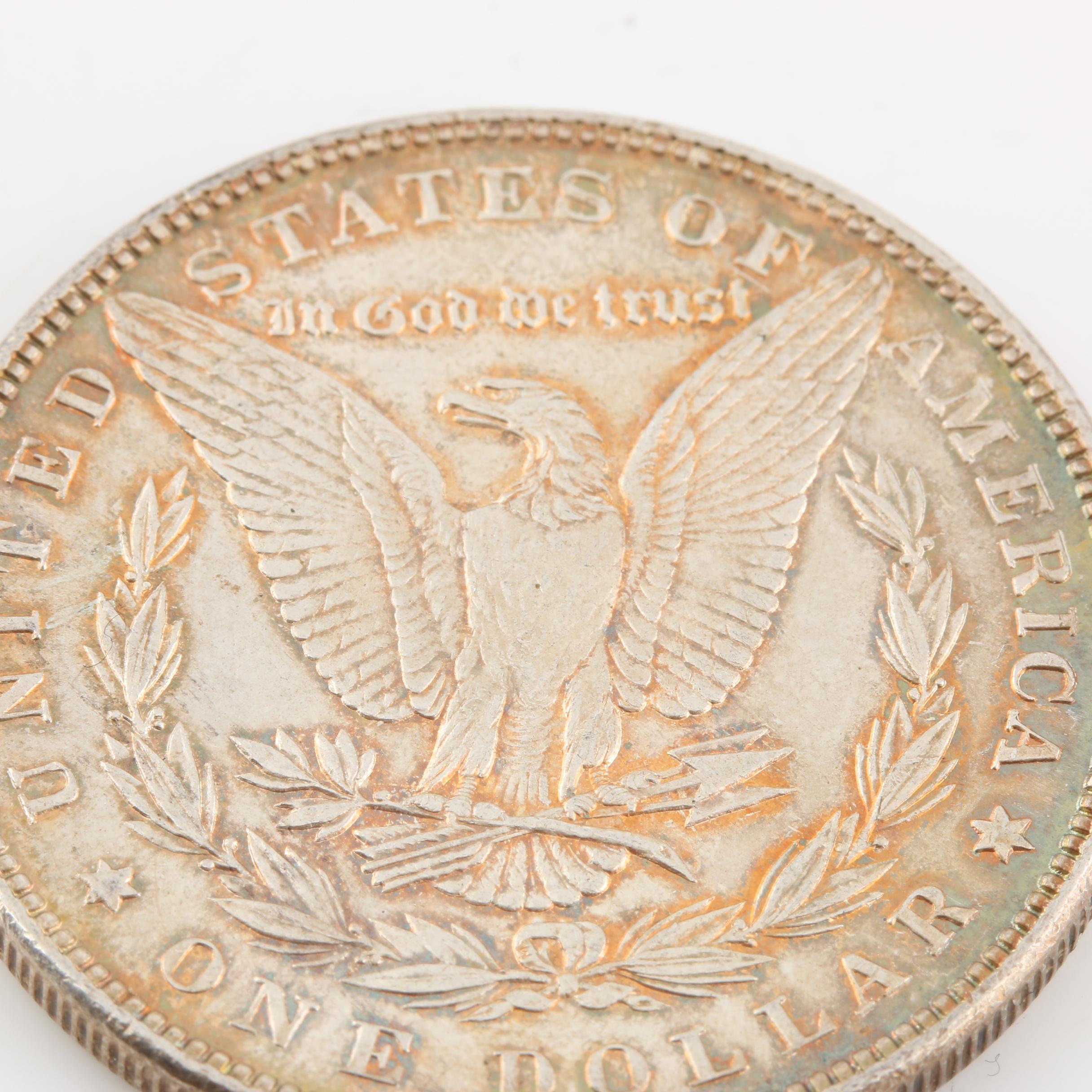 Morgan Silver Dollar and a Peace Silver Dollar