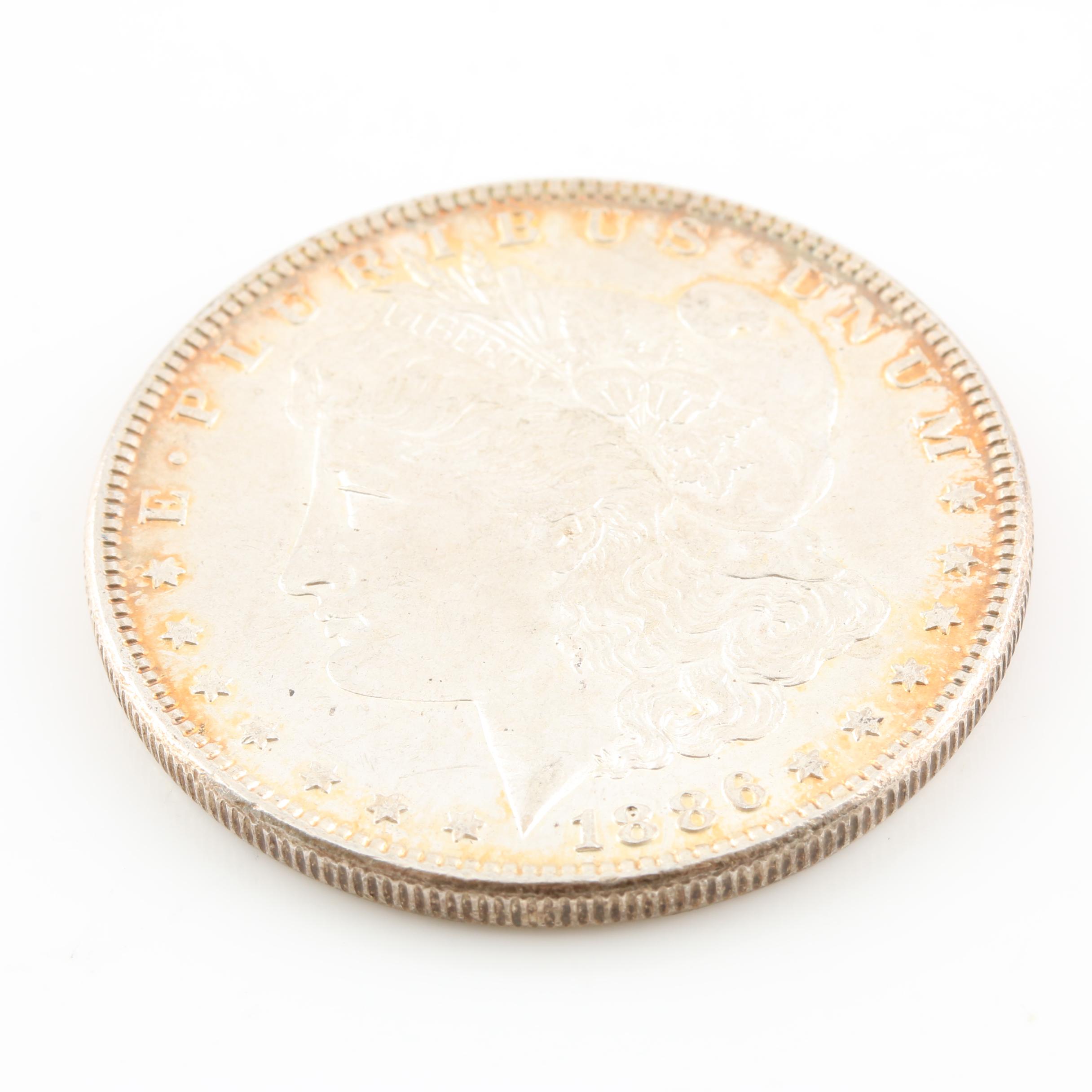 Morgan Silver Dollar and a Peace Silver Dollar