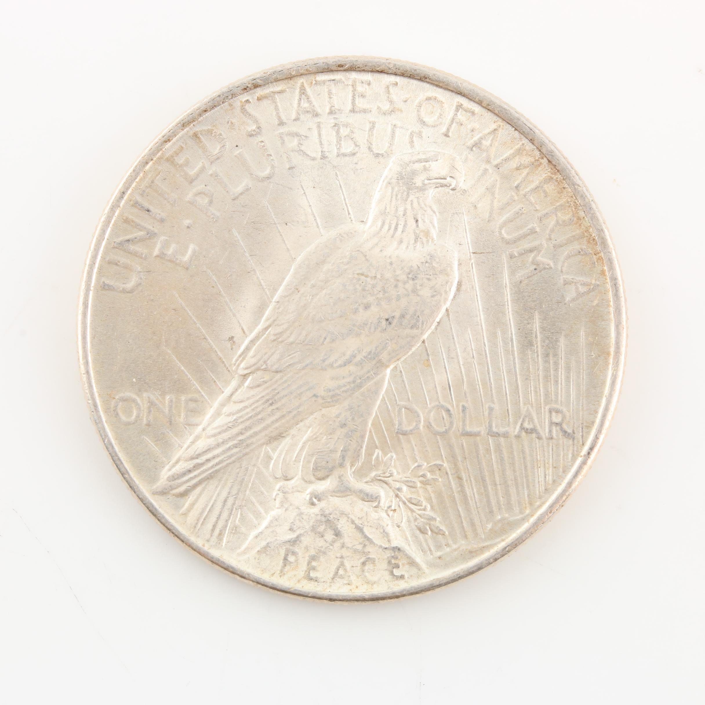 Morgan Silver Dollar and a Peace Silver Dollar