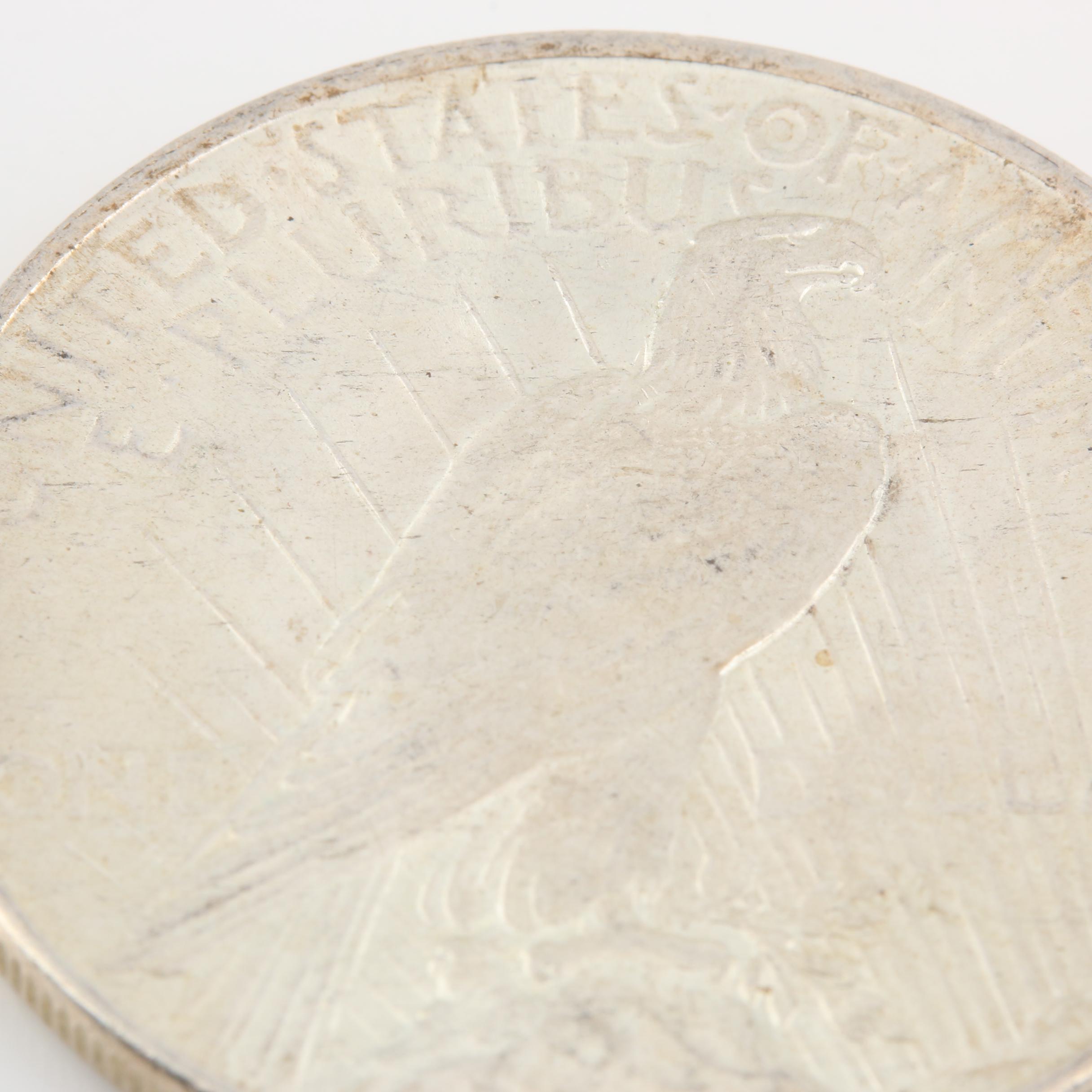 Morgan Silver Dollar and a Peace Silver Dollar