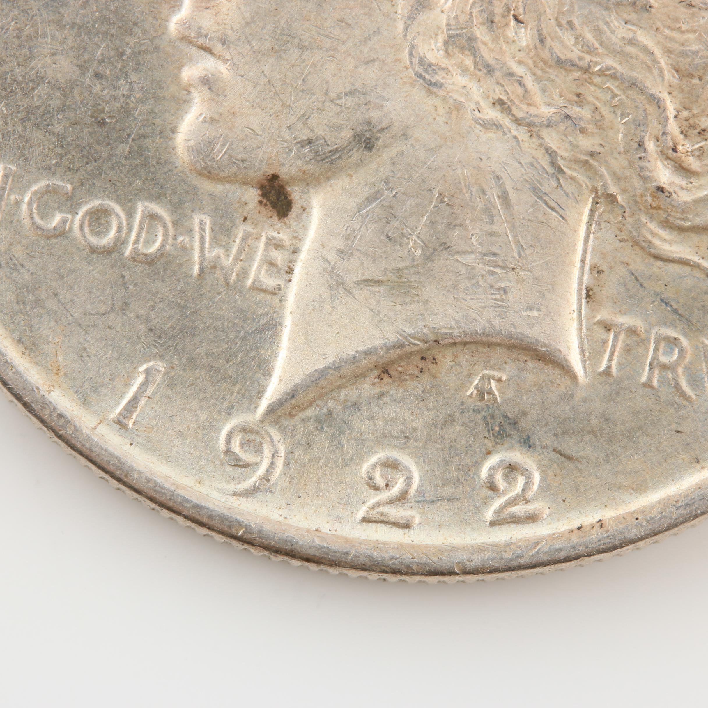 Morgan Silver Dollar and a Peace Silver Dollar