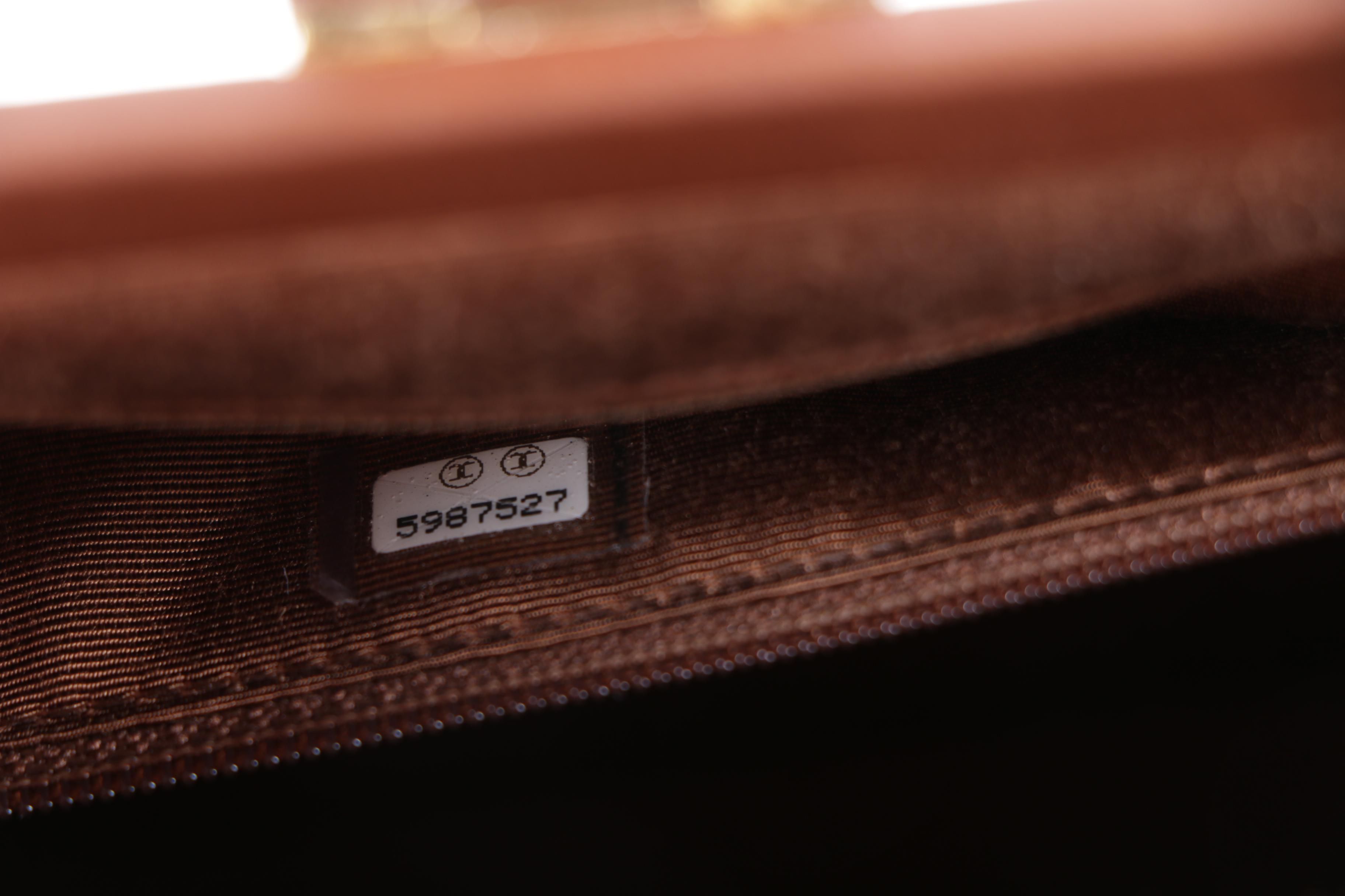 Chanel Woven Straw Handbag with Brown Leather Trim