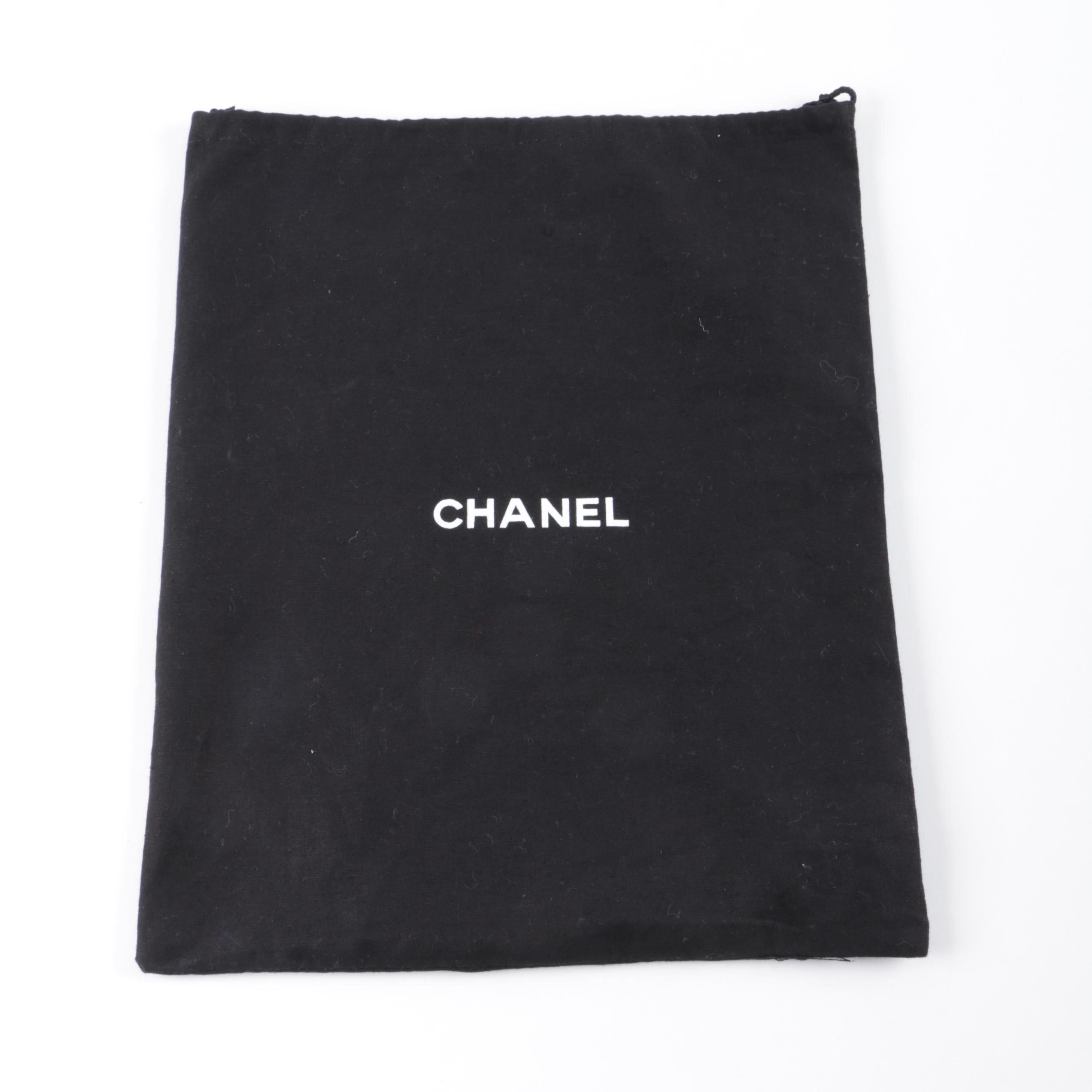 Chanel Woven Straw Handbag with Brown Leather Trim