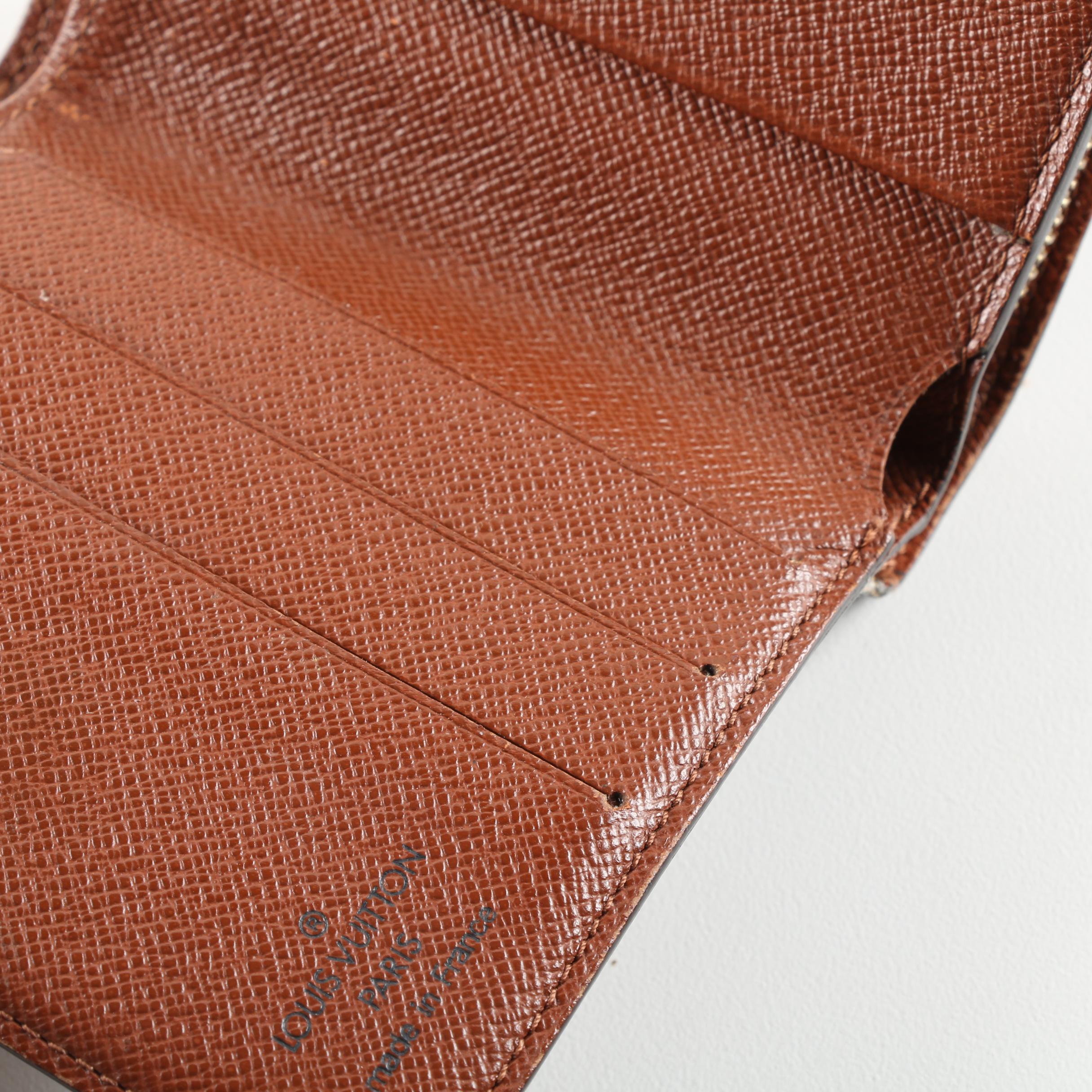 Louis Vuitton of Paris Monogram Zip Bifold Wallet