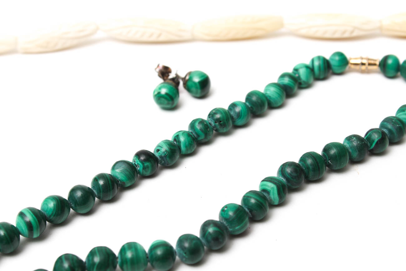 Selection of Jewelry Featuring Malachite, Bone, and Elk Teeth