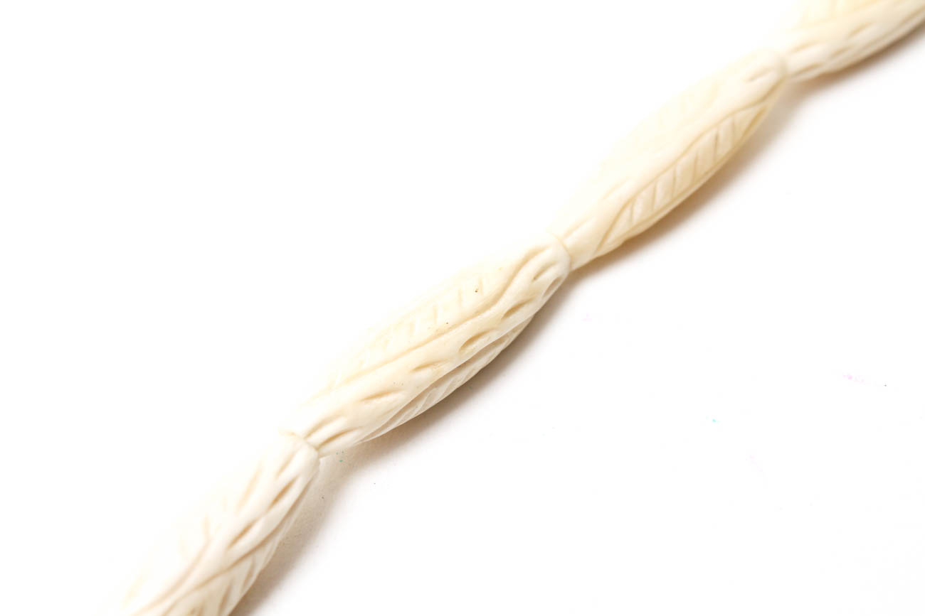 Selection of Jewelry Featuring Malachite, Bone, and Elk Teeth