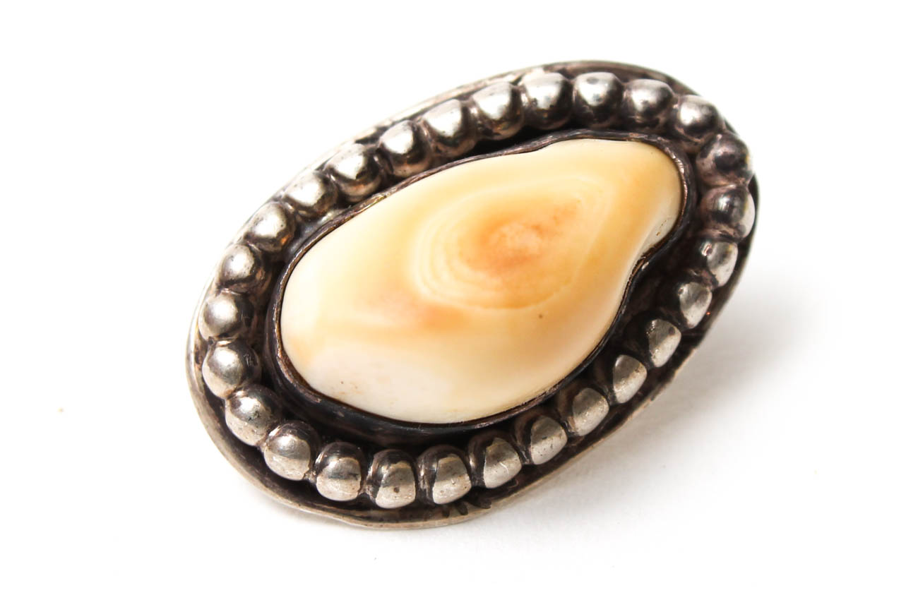 Selection of Jewelry Featuring Malachite, Bone, and Elk Teeth