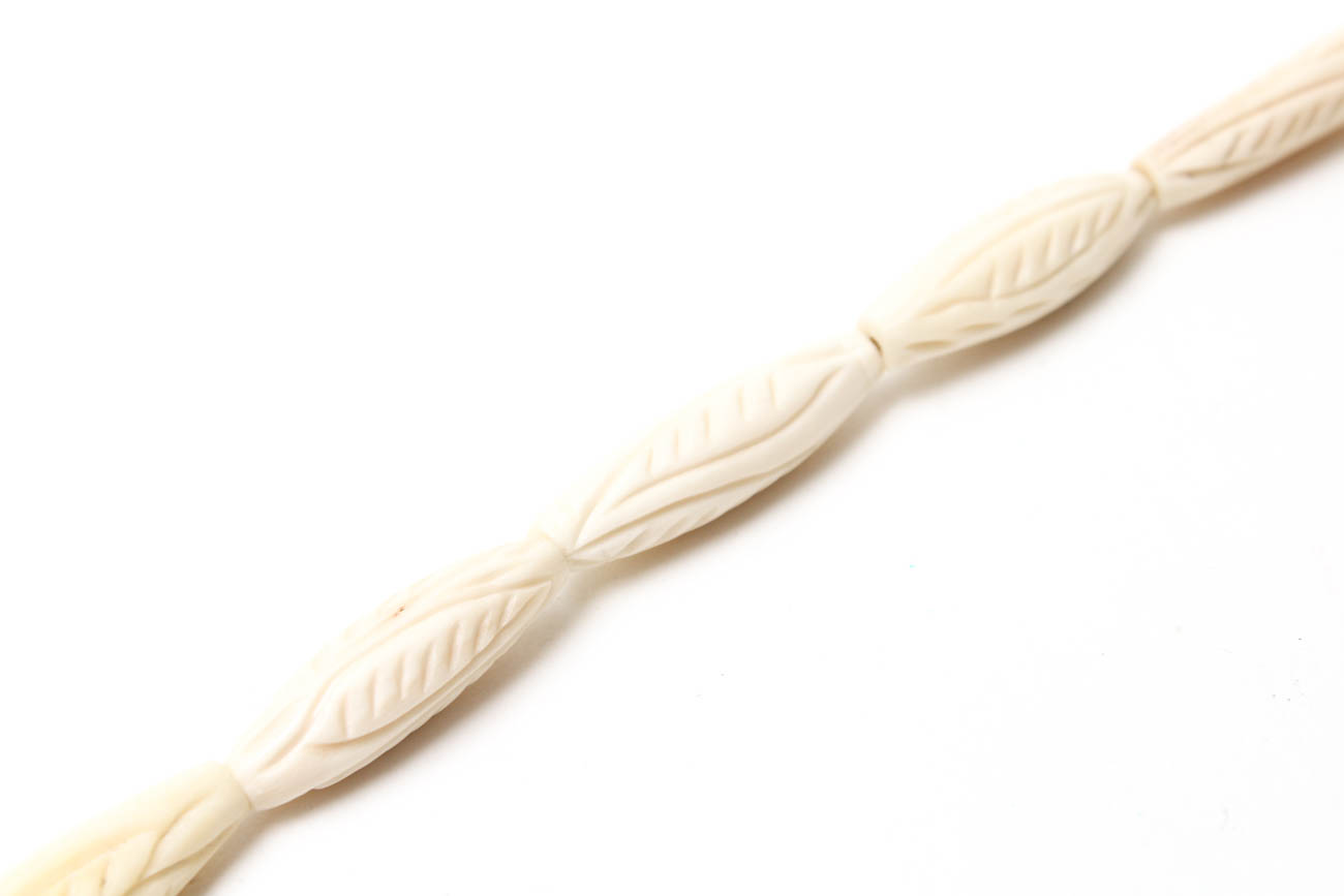 Selection of Jewelry Featuring Malachite, Bone, and Elk Teeth