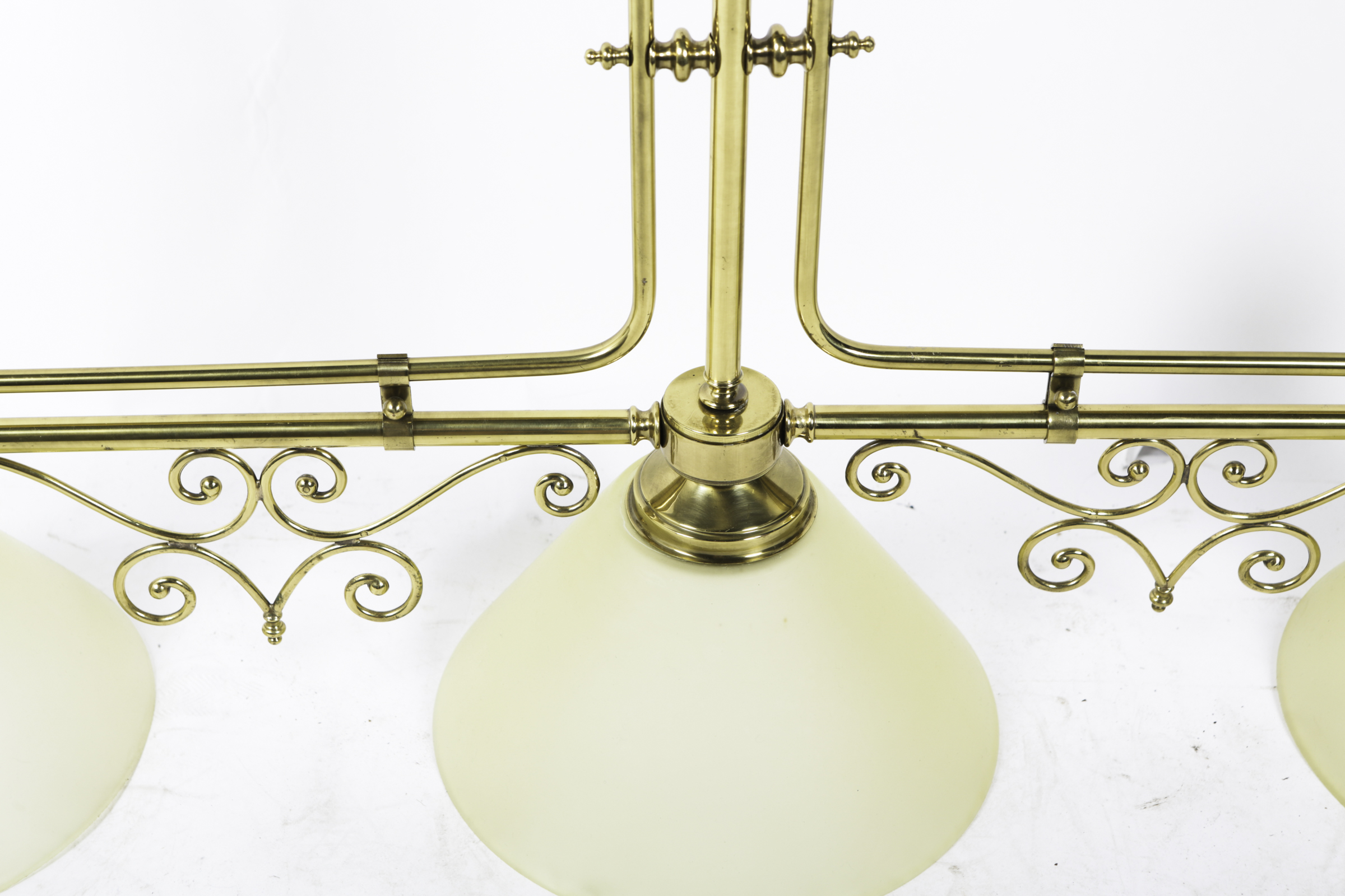 Three Light Brass Ceiling Pendant with Inverted White Glass Globes