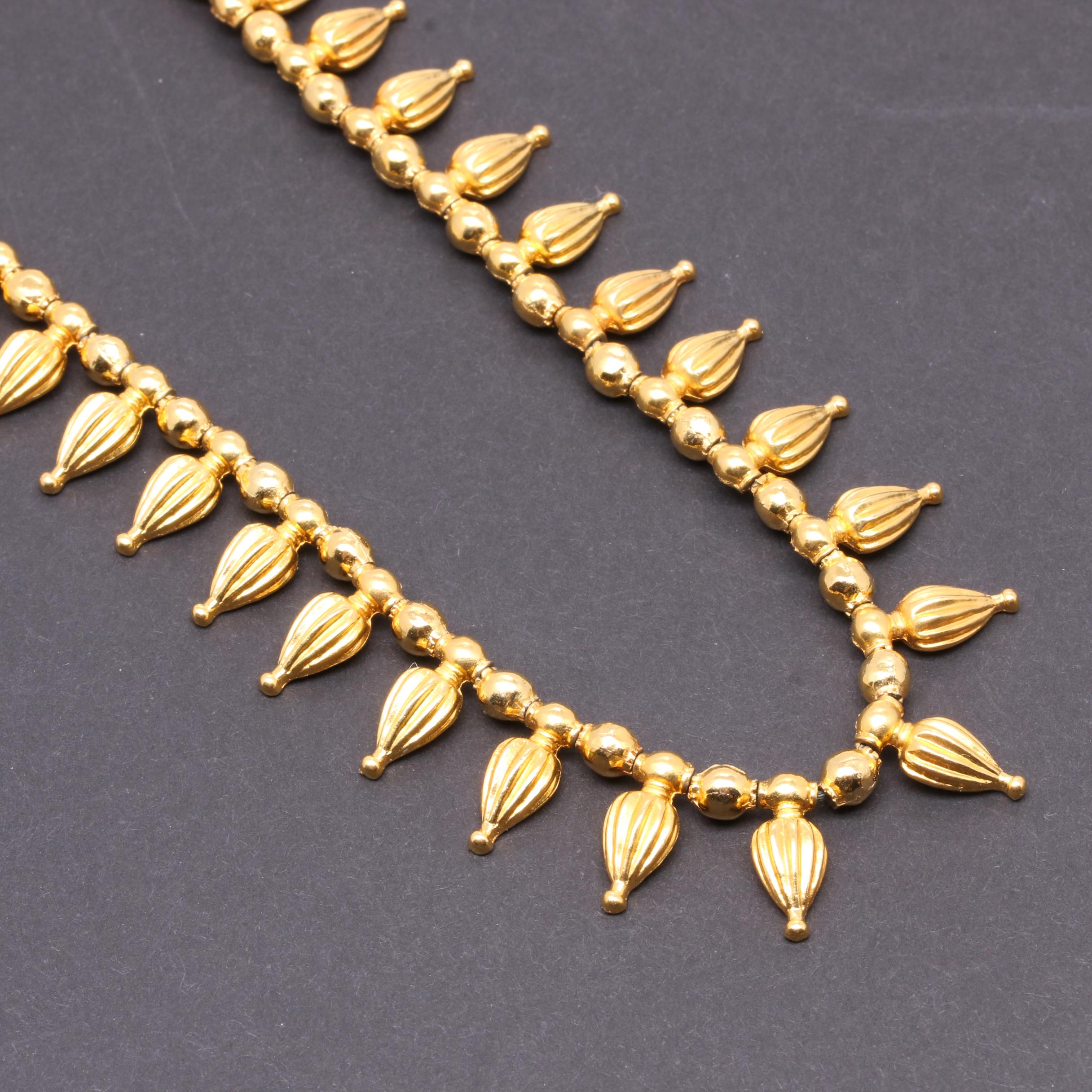 Gold Tone Necklace Selection Including Jasper, Nephrite, and Serpentine