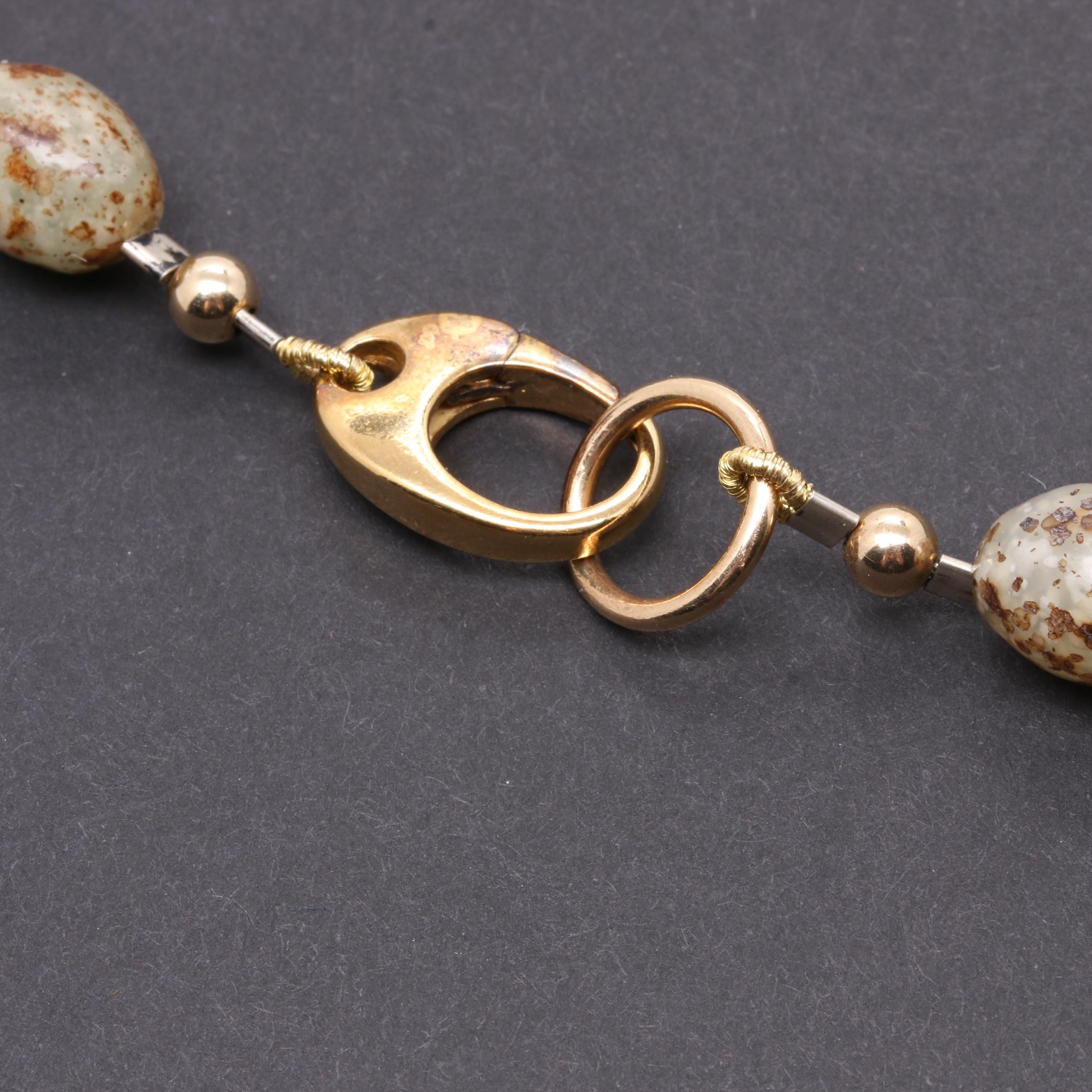 Gold Tone Necklace Selection Including Jasper, Nephrite, and Serpentine