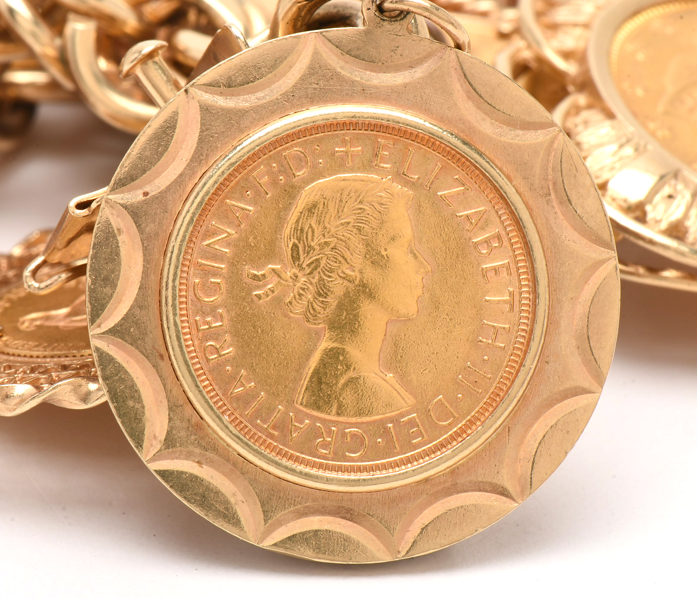 14K Yellow Gold Bracelet with Sixteen World Gold Coin Charms