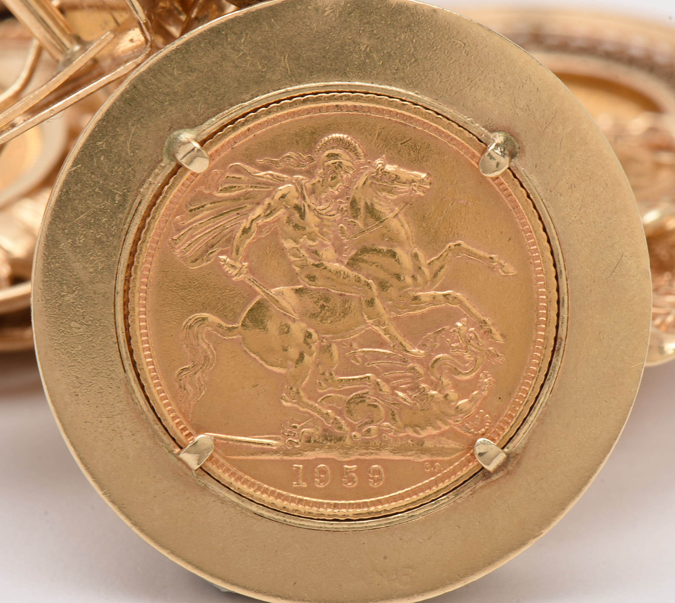 14K Yellow Gold Bracelet with Sixteen World Gold Coin Charms