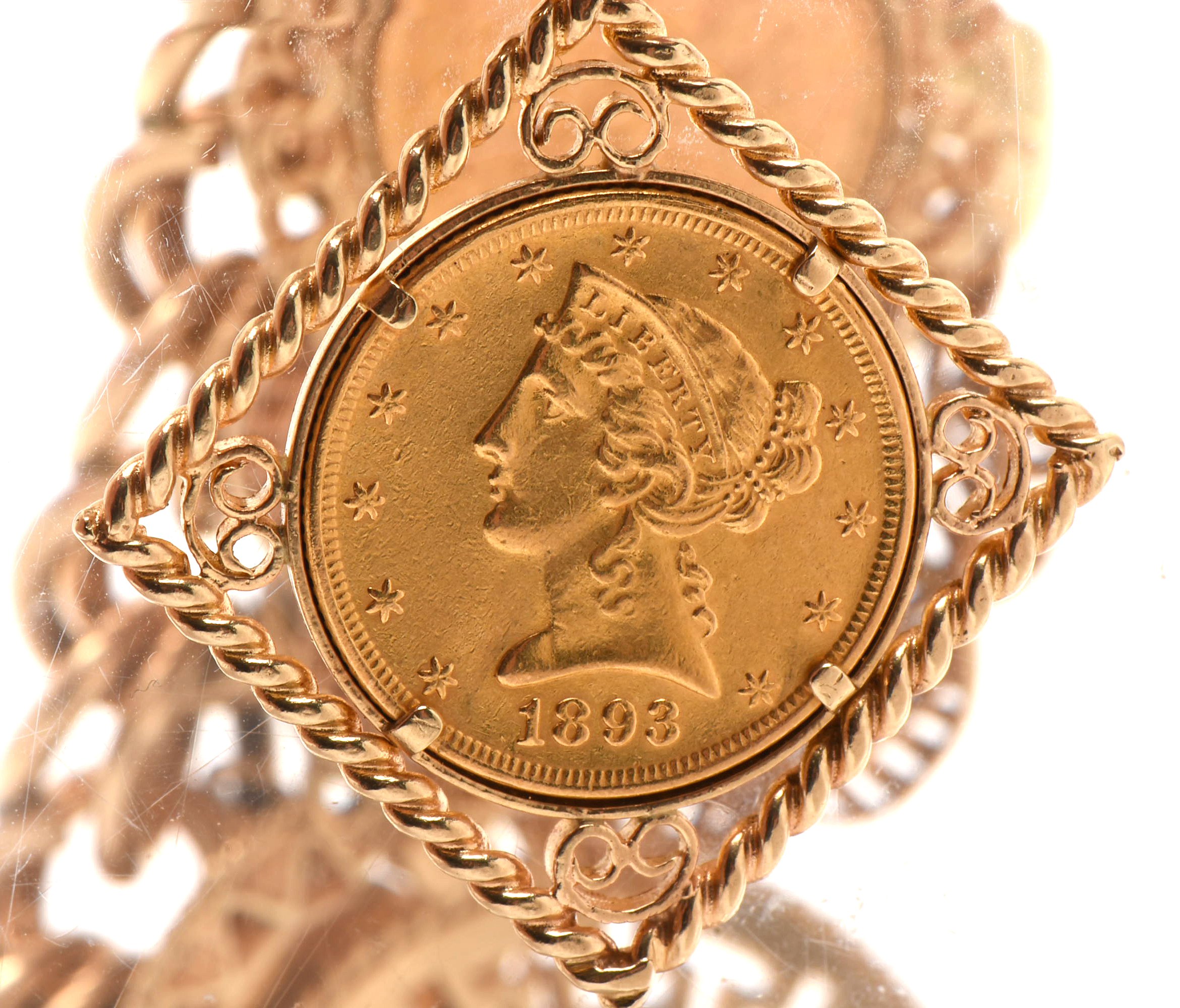 14K Yellow Gold Bracelet with Sixteen World Gold Coin Charms
