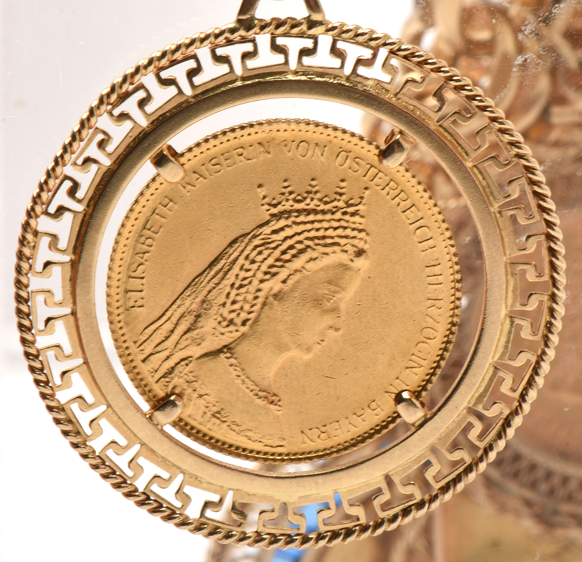 14K Yellow Gold Bracelet with Sixteen World Gold Coin Charms