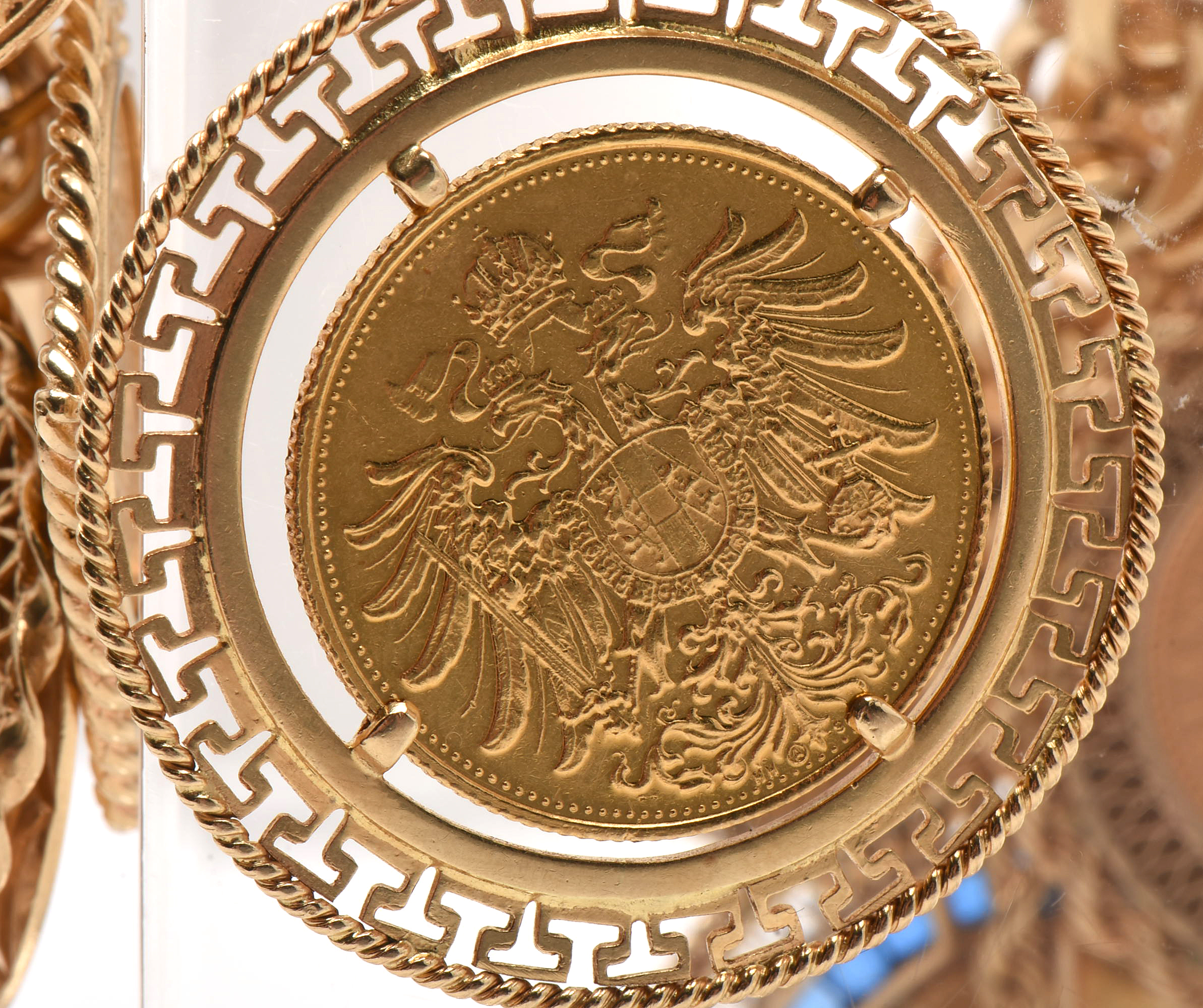 14K Yellow Gold Bracelet with Sixteen World Gold Coin Charms