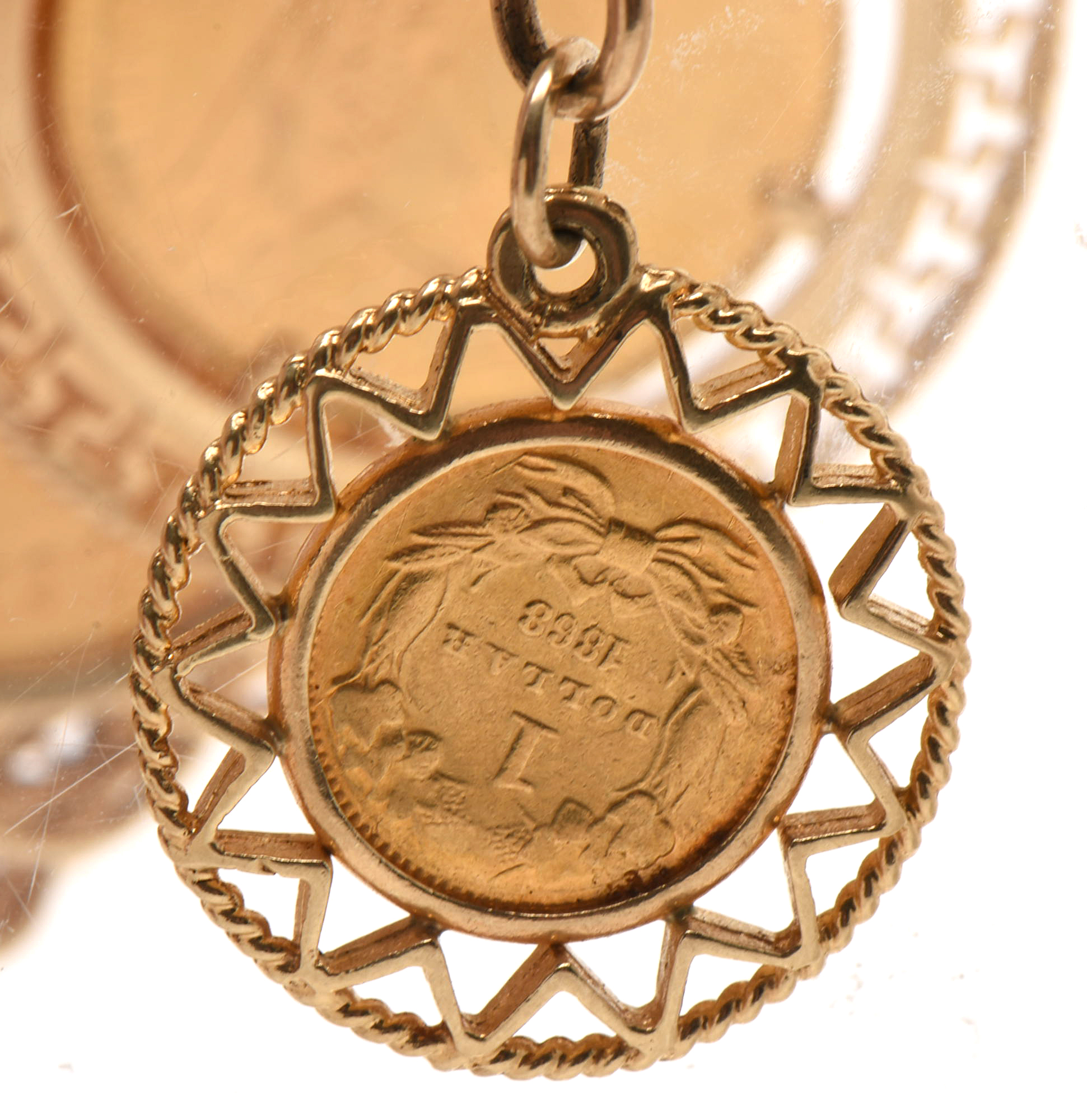 14K Yellow Gold Bracelet with Sixteen World Gold Coin Charms