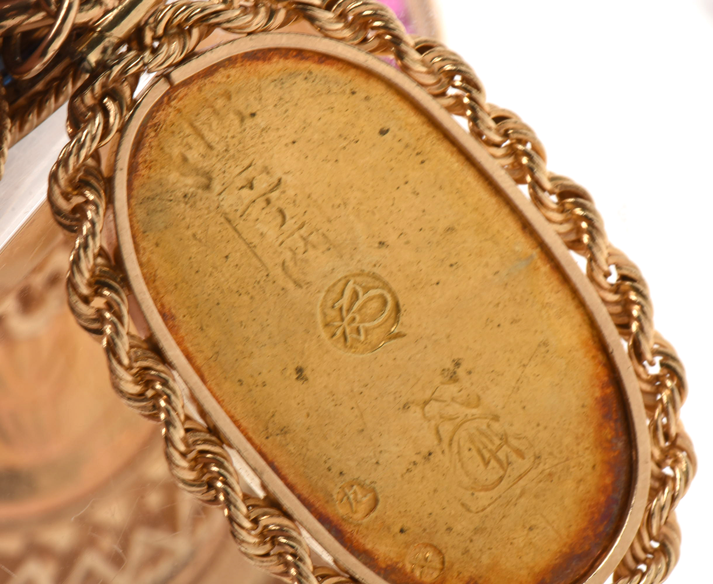 14K Yellow Gold Bracelet with Sixteen World Gold Coin Charms