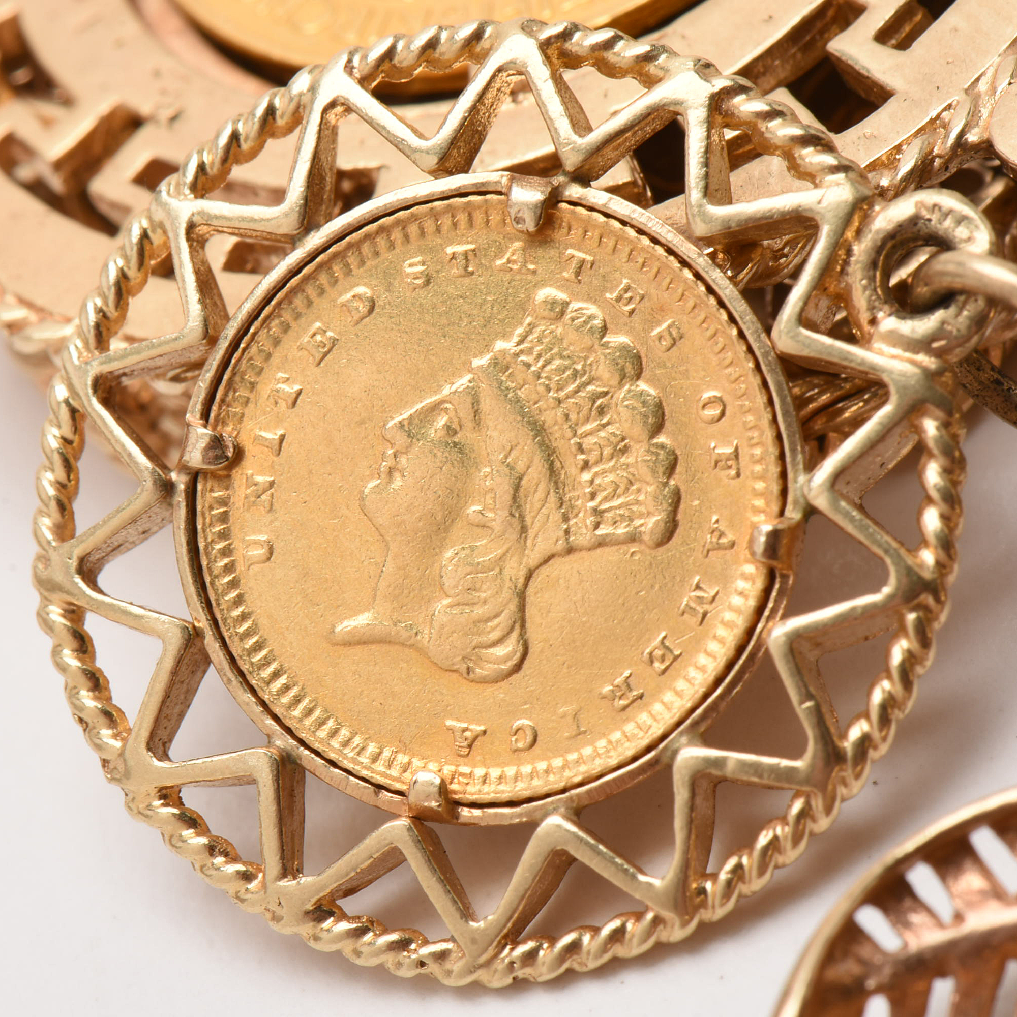 14K Yellow Gold Bracelet with Sixteen World Gold Coin Charms