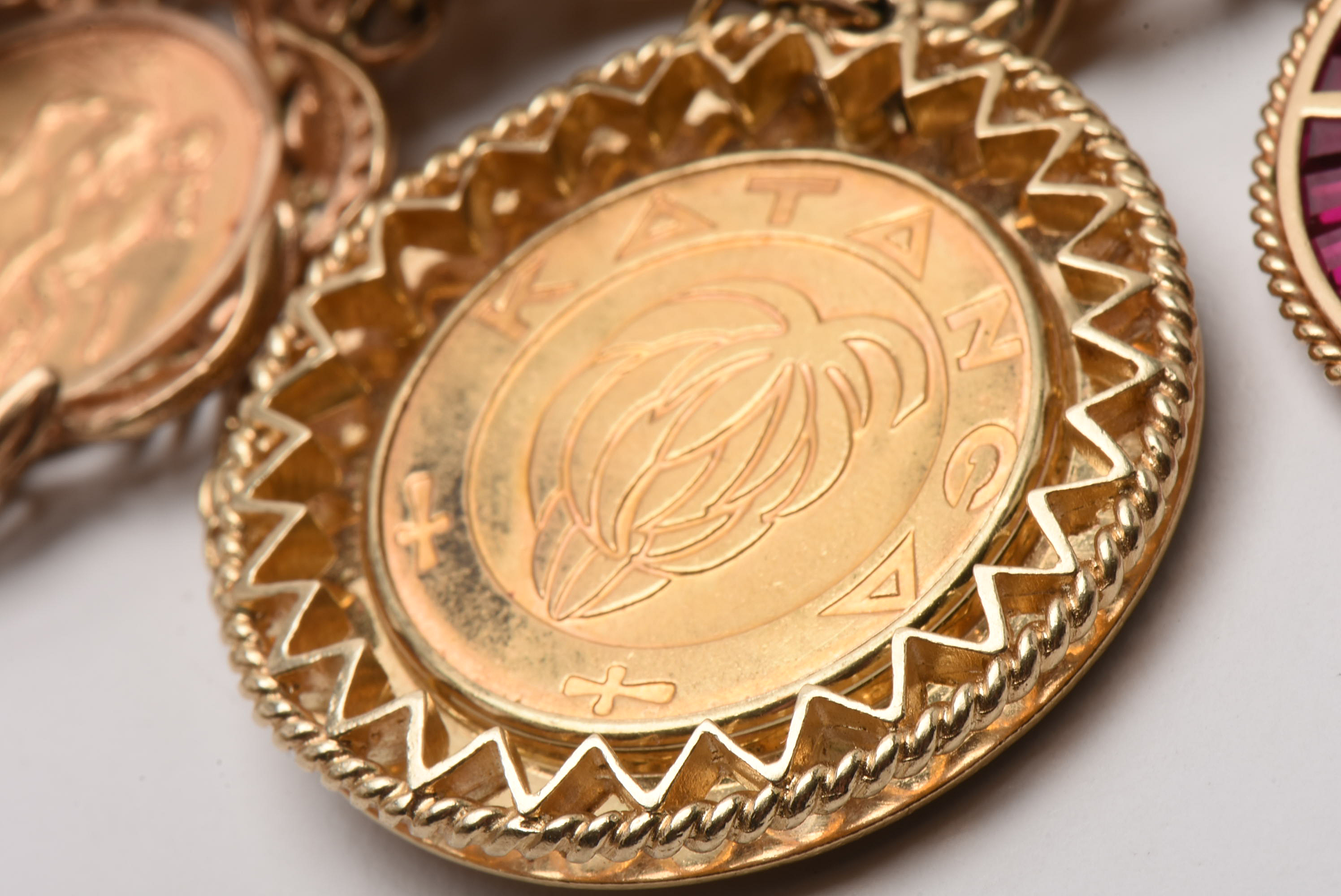 14K Yellow Gold Bracelet with Sixteen World Gold Coin Charms