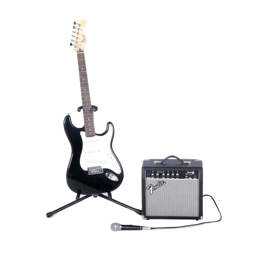 Squier Strat Guitar, Stand and Frontman 15 G Amplifier