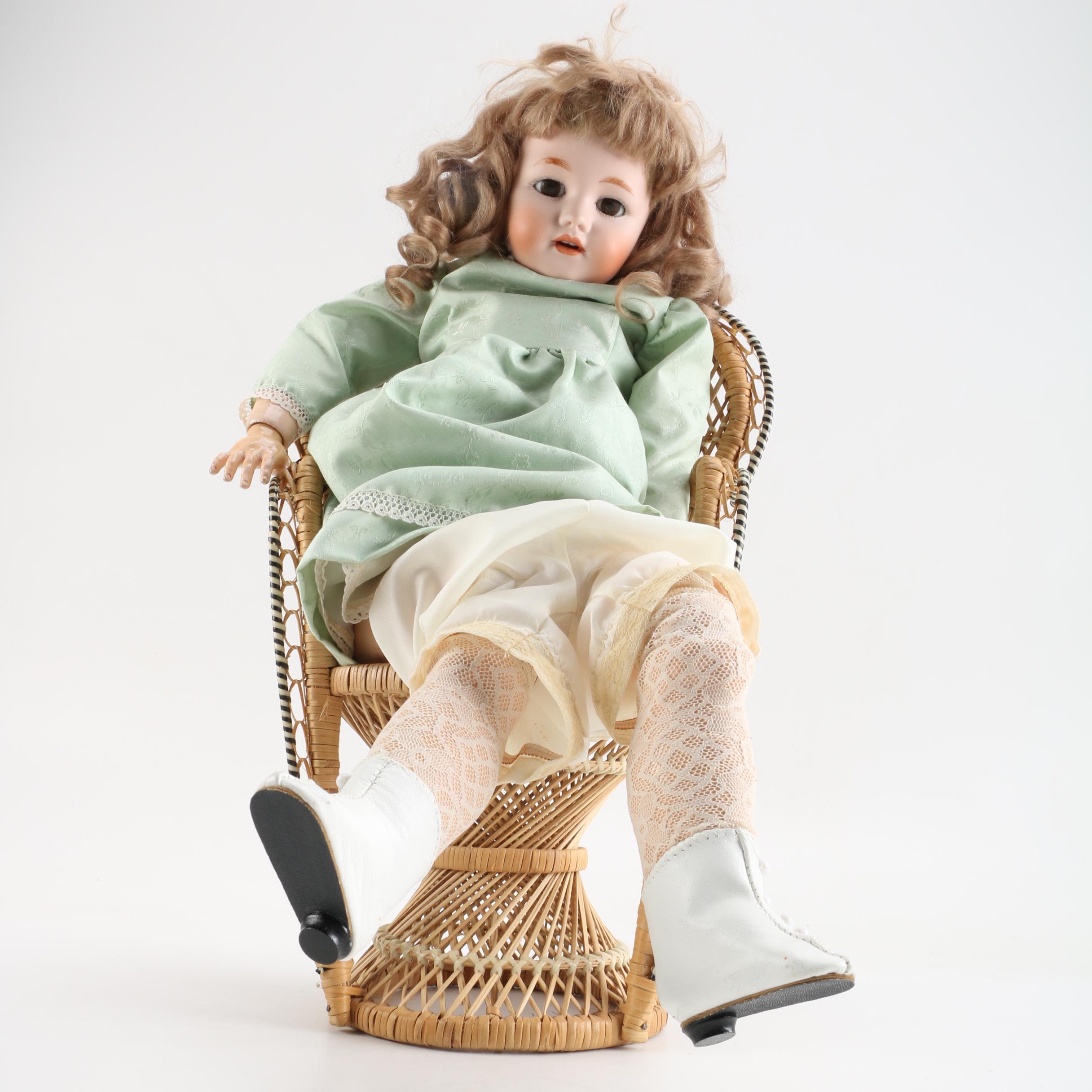 Vintage Doll and Wicker Chair