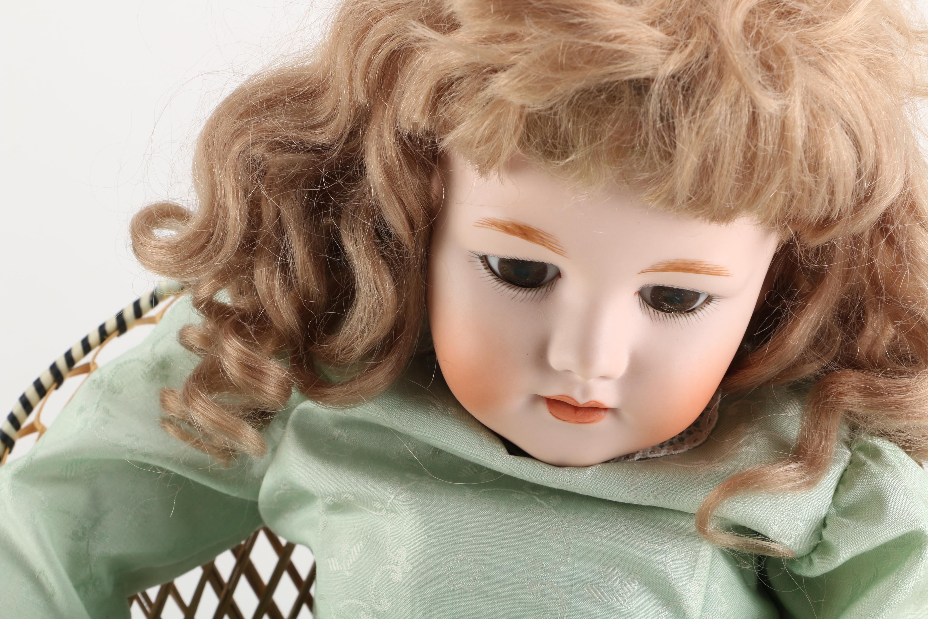 Vintage Doll and Wicker Chair